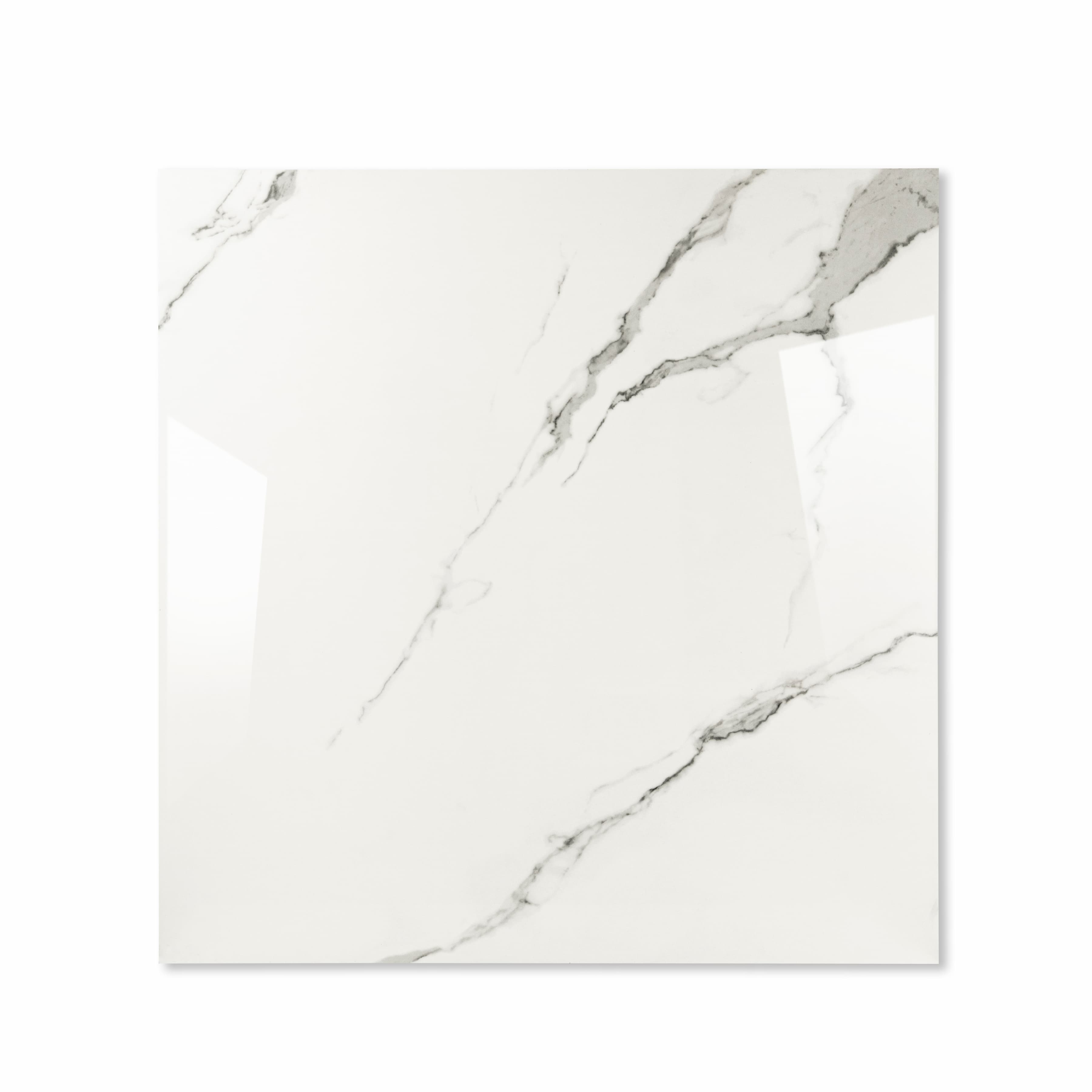 Top view of Statuario Hexa minimalist Italian marble-effect porcelain tile with sparse charcoal veining and glossy finish