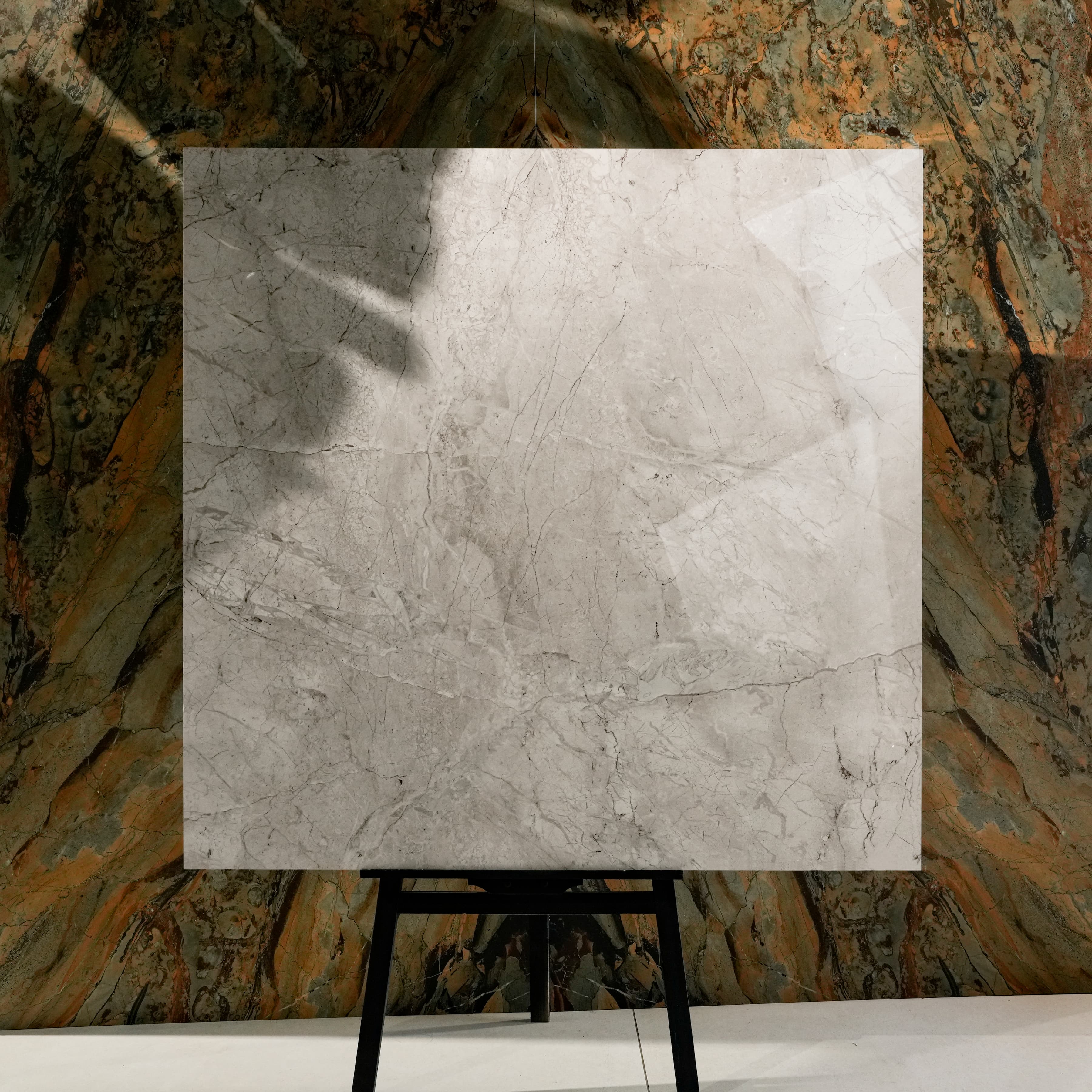 Top view of Breccia Bianco Italian Breccia-effect porcelain tile with warm greige base and intricate fissure veining
