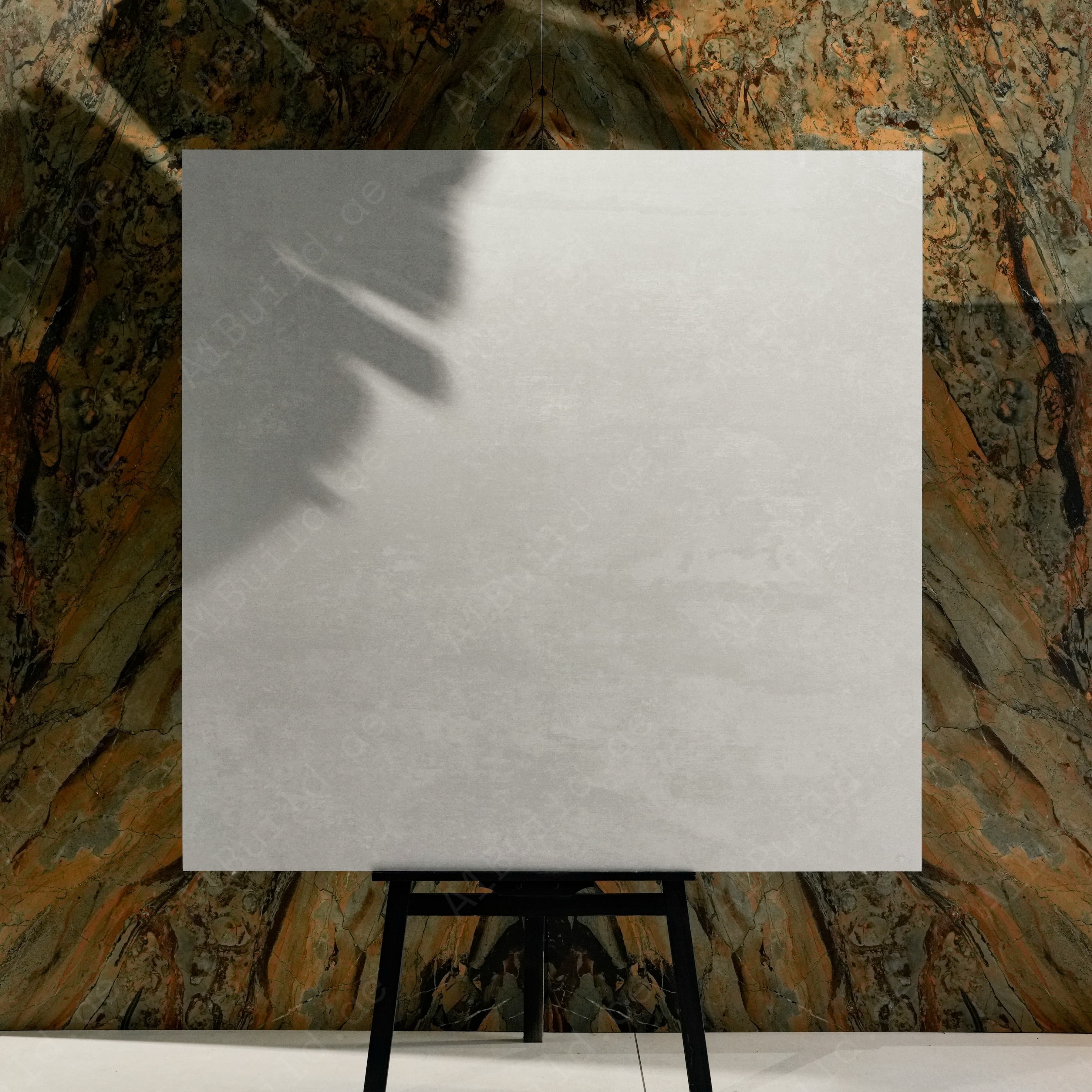 Granite White 120x120cm modern brushed white matte porcelain tile on easel against onyx marble backdrop in UAE luxury tile showroom