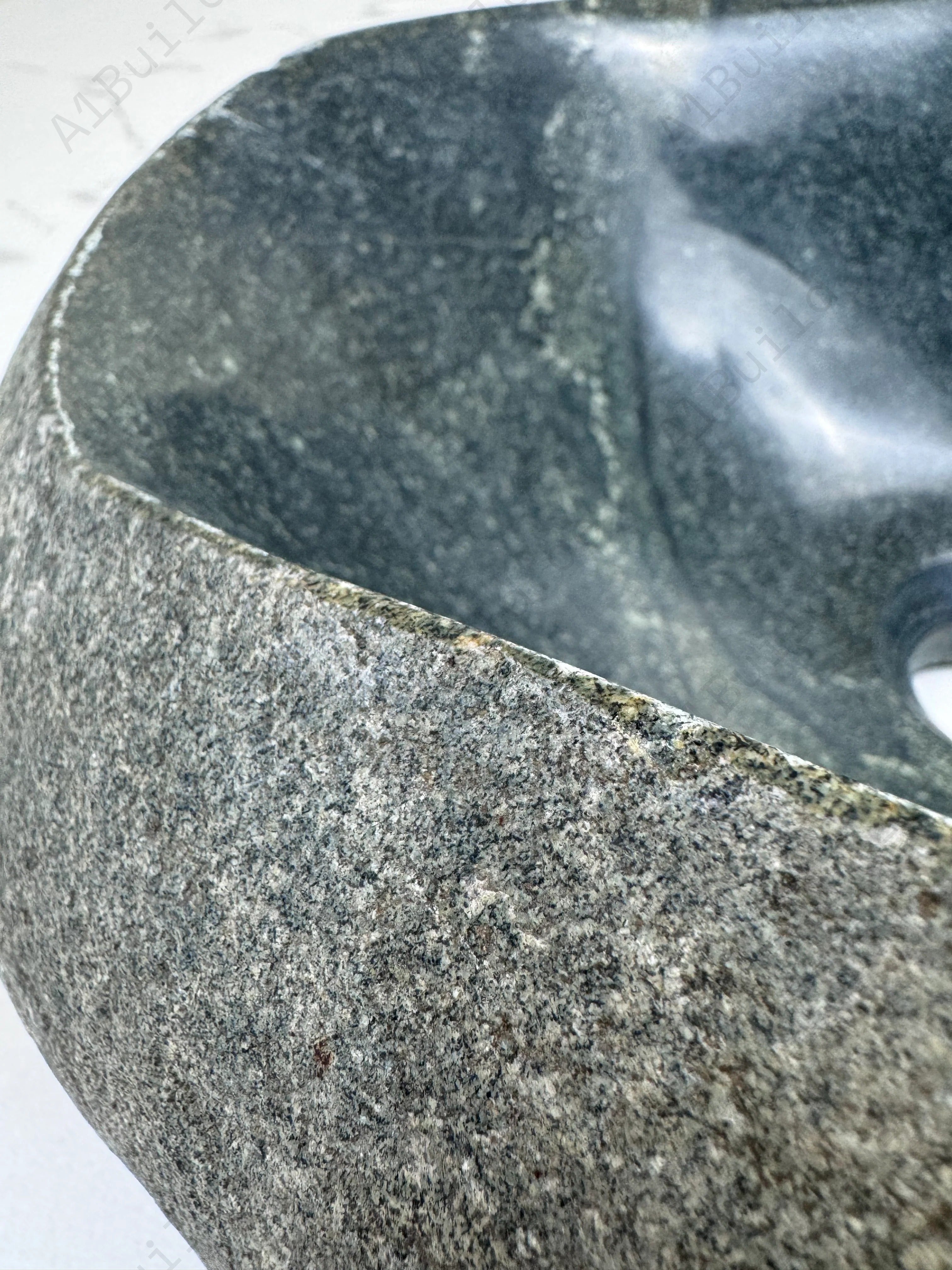 Add natural charm to your bathroom with the Marble Muse Pebble Stone Polished Irregular Wash Basin, crafted from premium marble for timeless elegance.