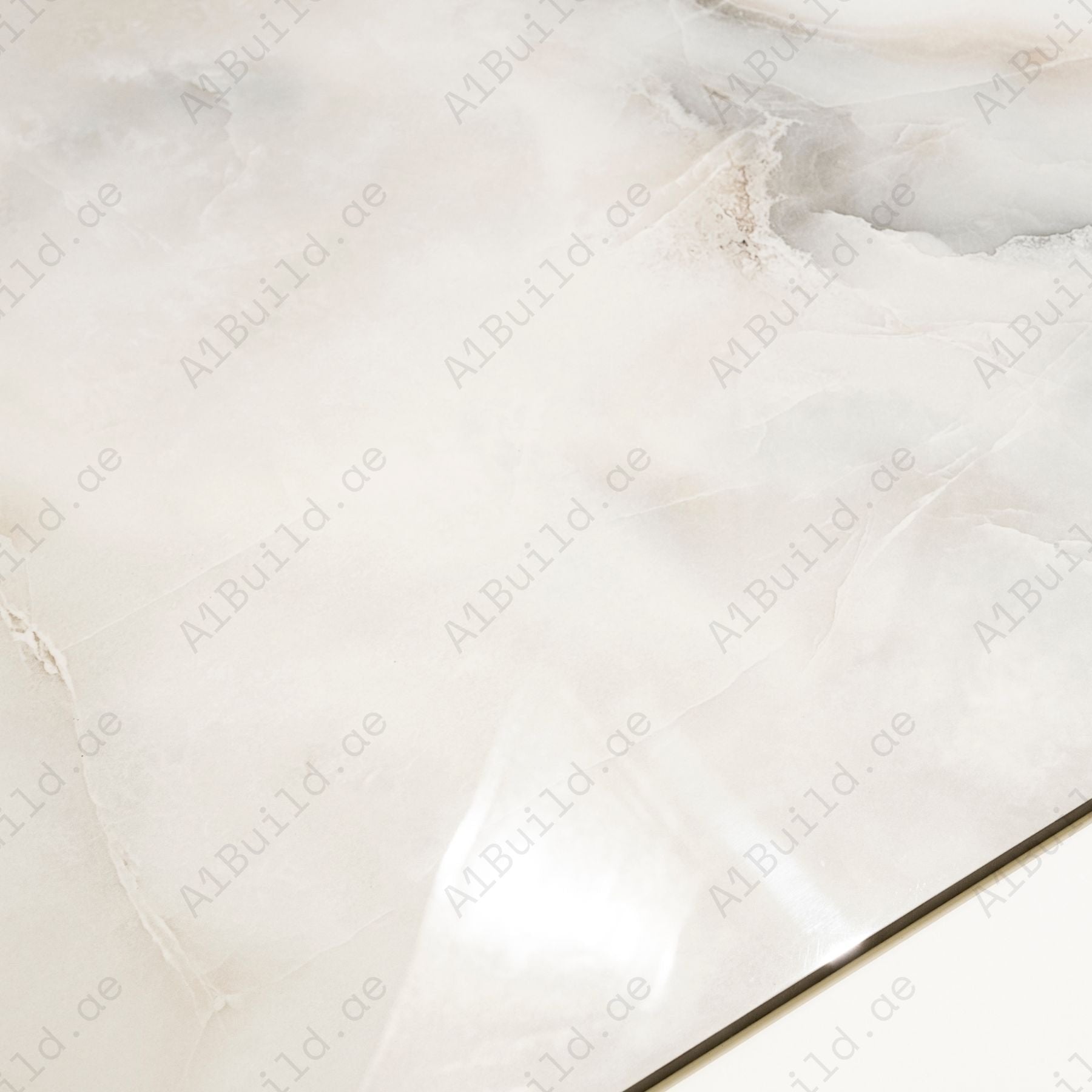 Aurora Pearl glossy marble porcelain tile 60x120cm with 9mm thickness features soft pearl tones, subtle veining and polished finish.