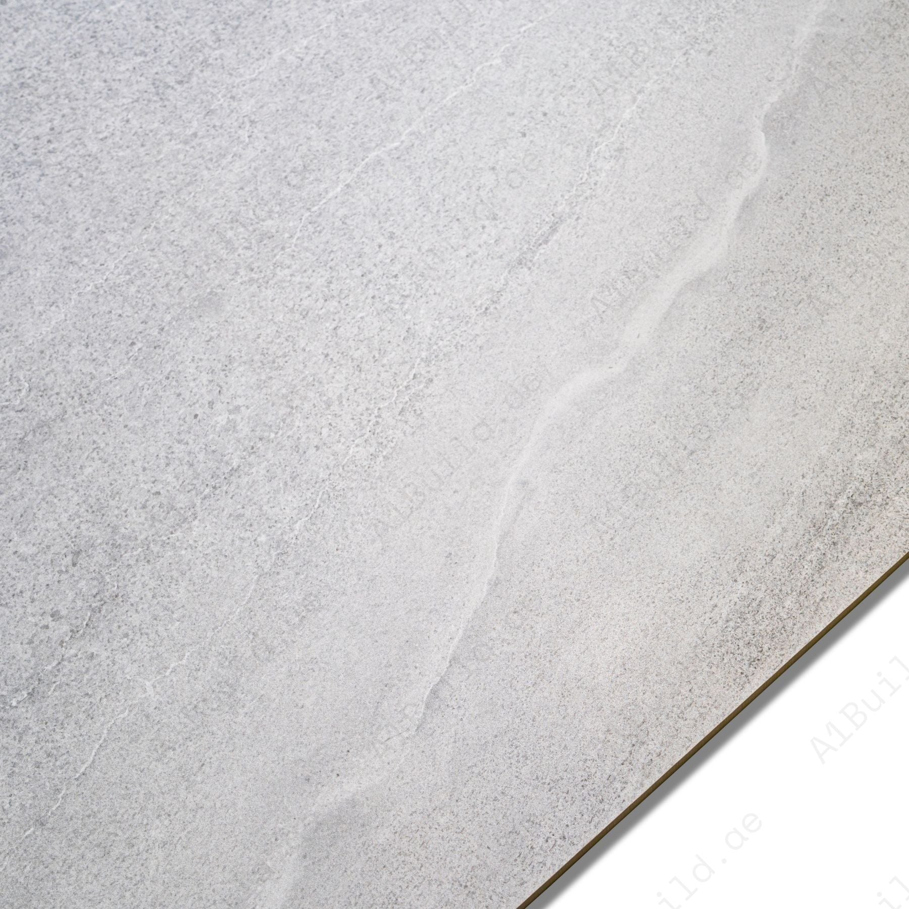 Basalt Silver Sicura porcelain tile 60×120cm with anti-slip stone finish, durable porcelain strength ideal for floors and wet areas.