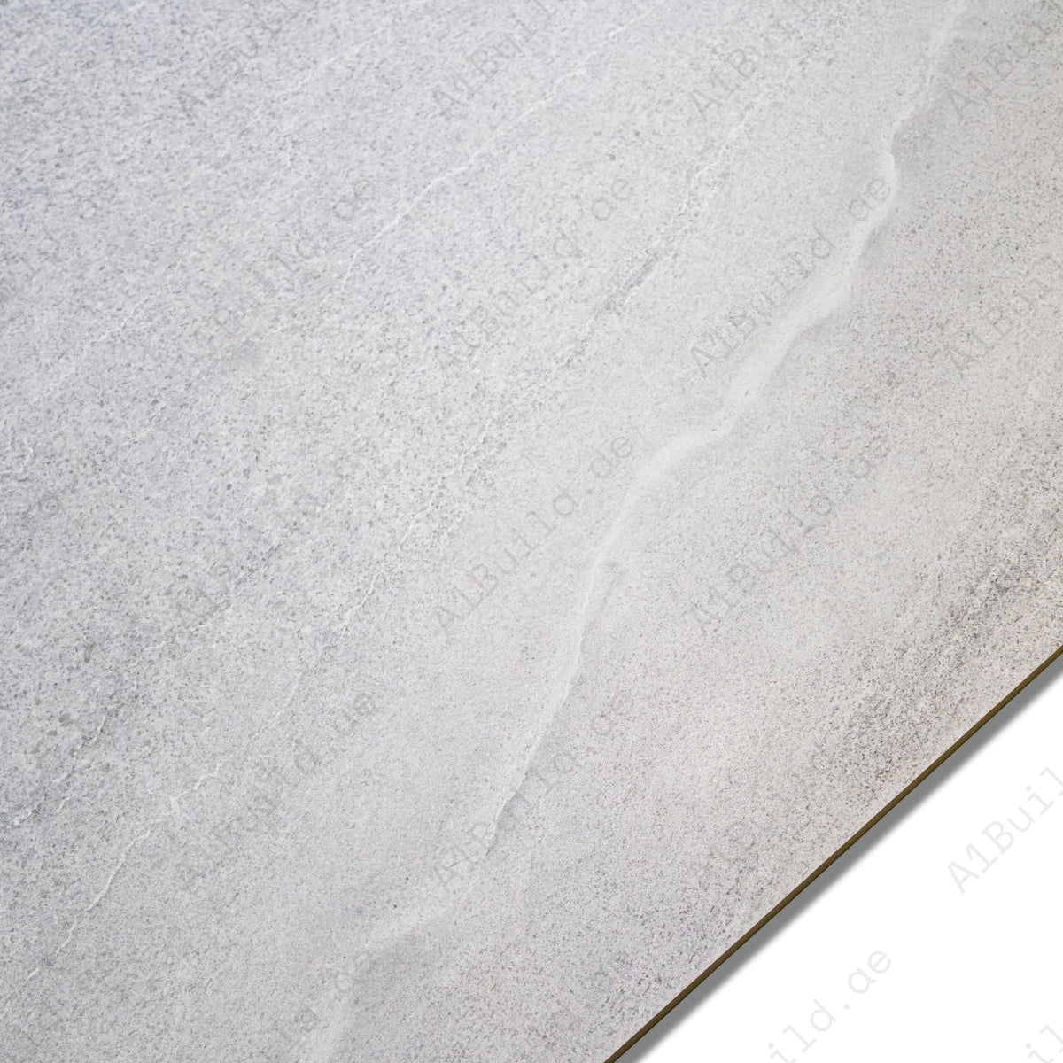 Basalt Silver Sicura porcelain tile 60×120cm with anti-slip stone finish, durable porcelain strength ideal for floors and wet areas.