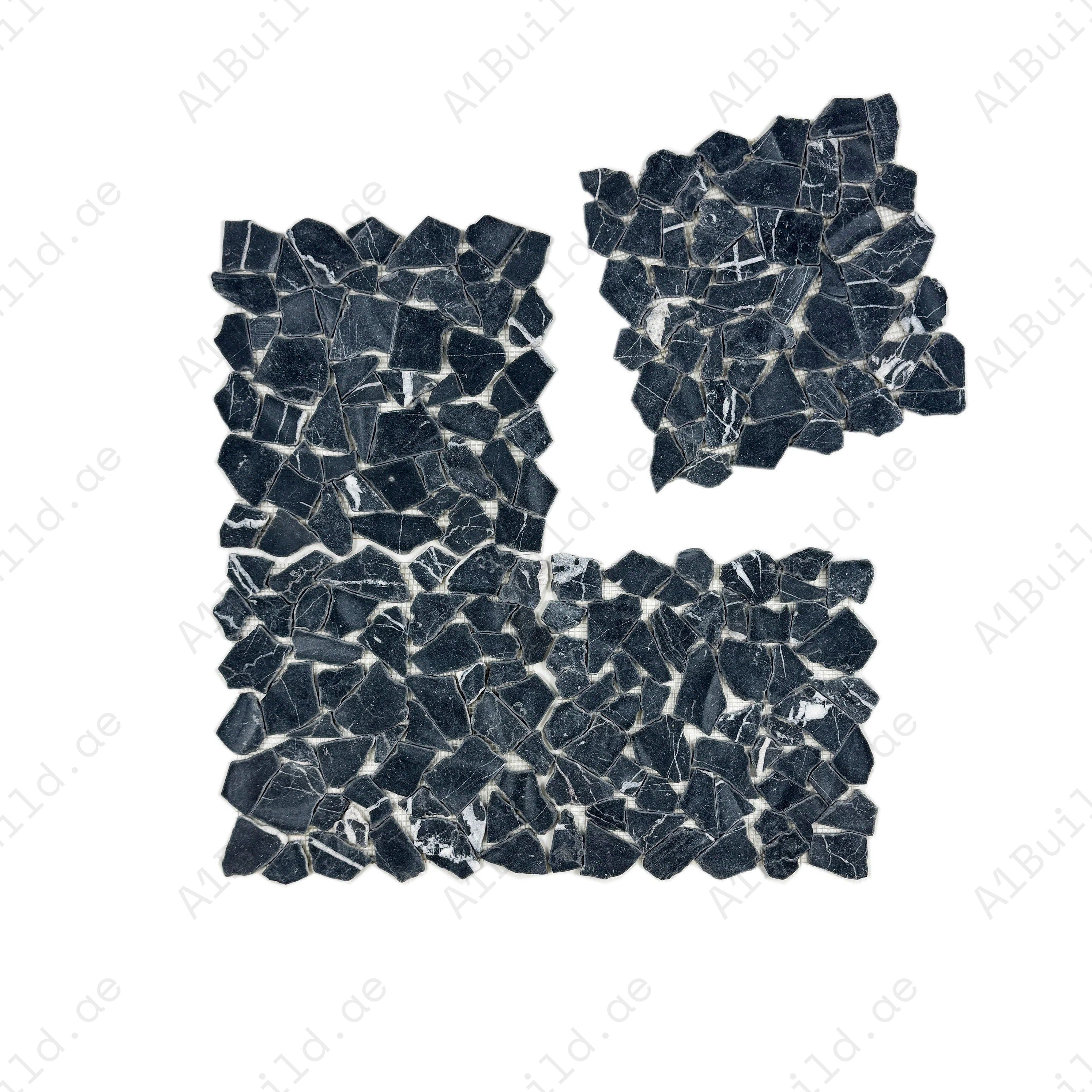 Black Marquina honed irregular marble mosaic tile for walls & floors. Durable, stylish, and ideal for luxury interiors with timeless elegance & charm.