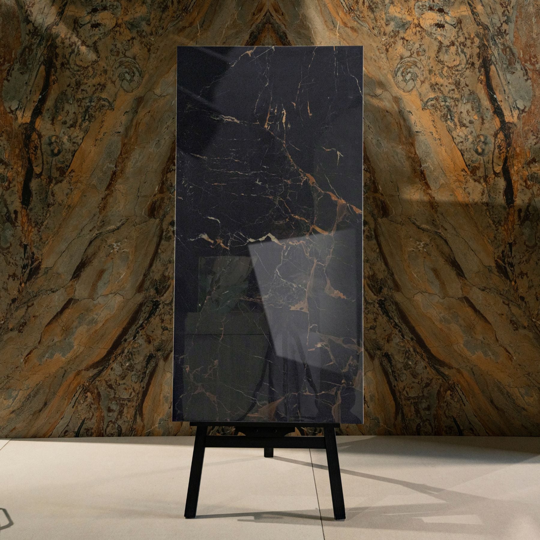 Black Wonder glossy marble effect porcelain tile 60x120cm with 9mm thickness features deep black base and polished luxury finish.