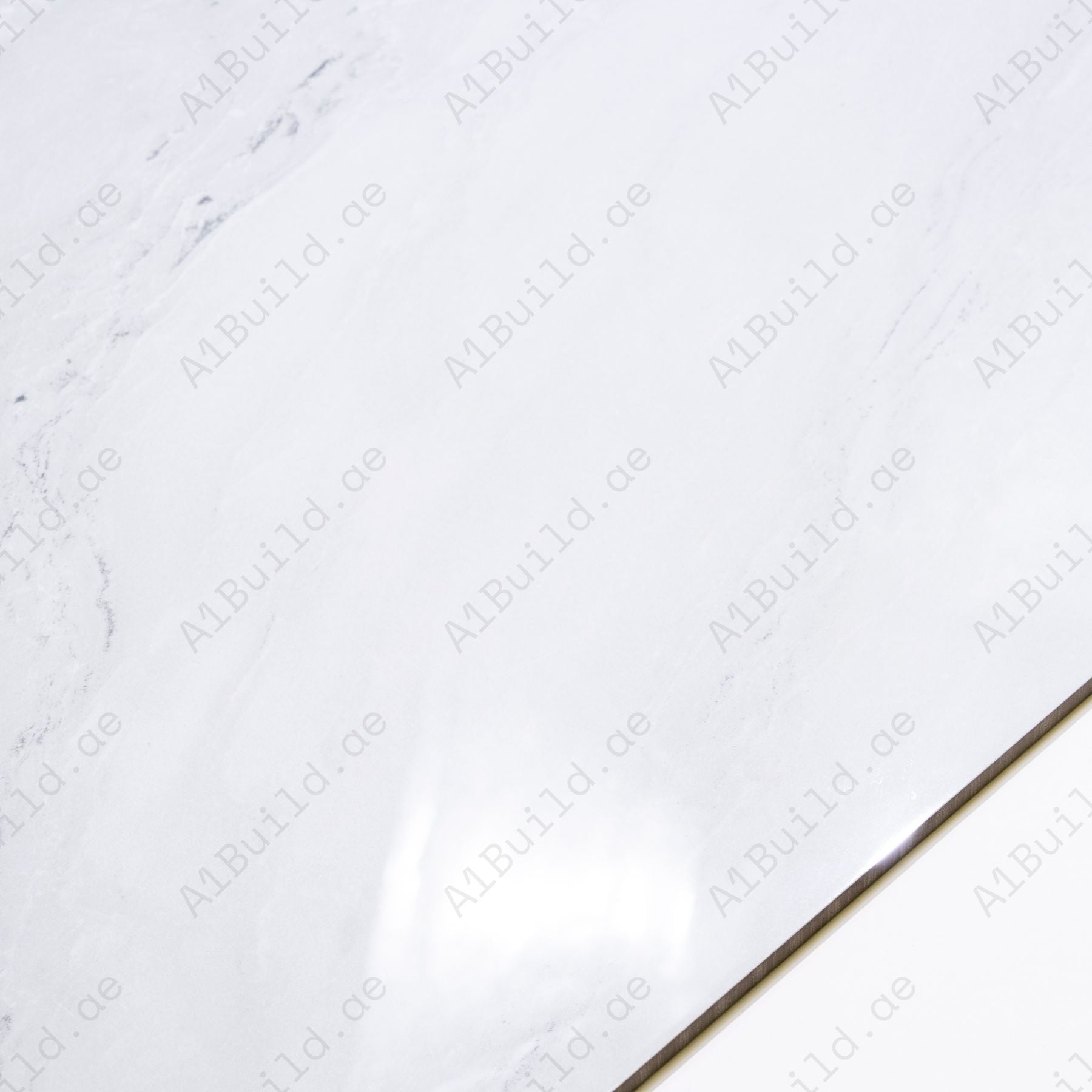 Celeste White glossy marble effect porcelain tile 60x120cm with 9mm thickness features bright white base, soft grey veins and polished finish.
