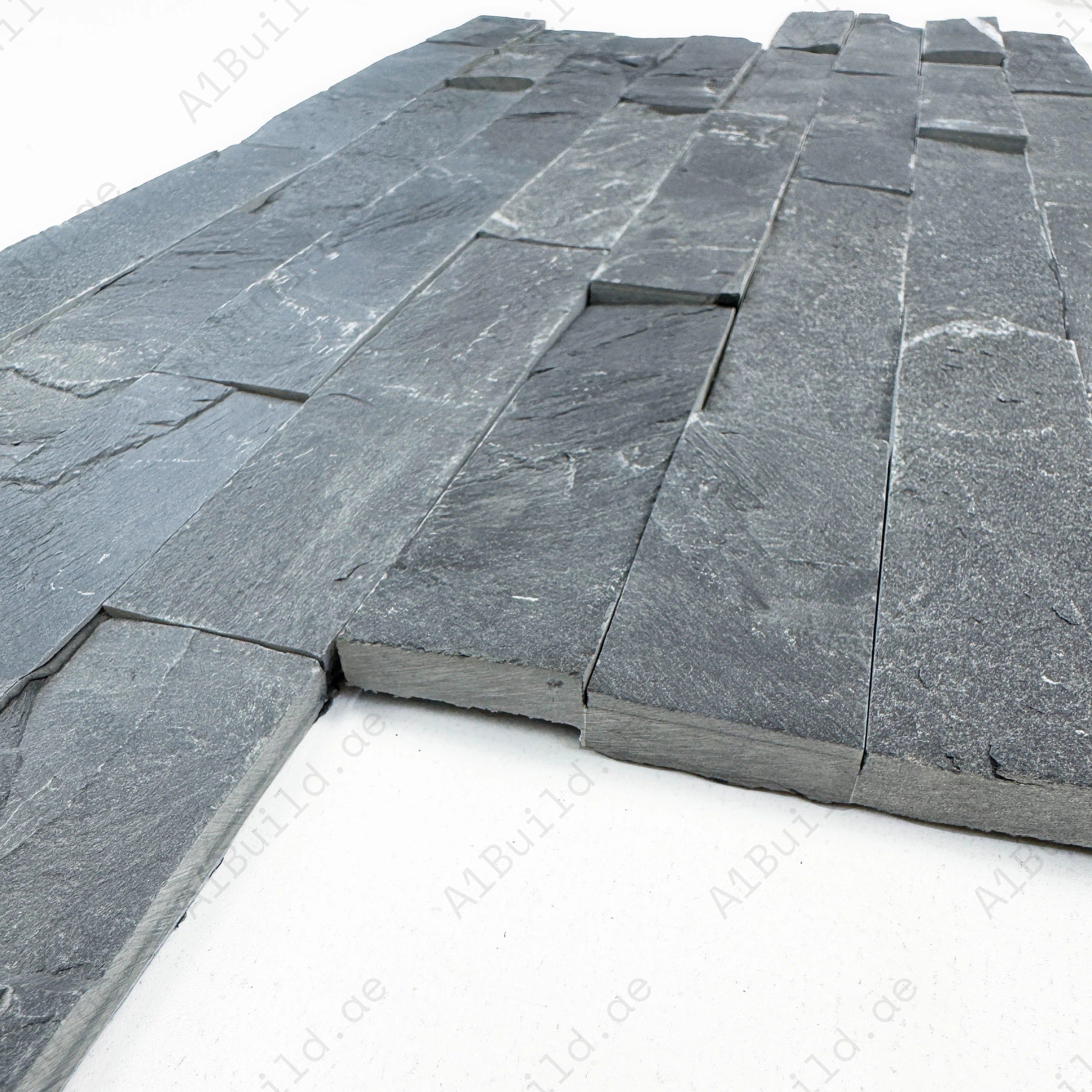 Celestial Terra P018 black flat slate wall cladding, 150x600mm. 8 pcs/box (0.72 sqm), 23Kg/sqm. Durable natural stone with 4-line sheet design for walls.
