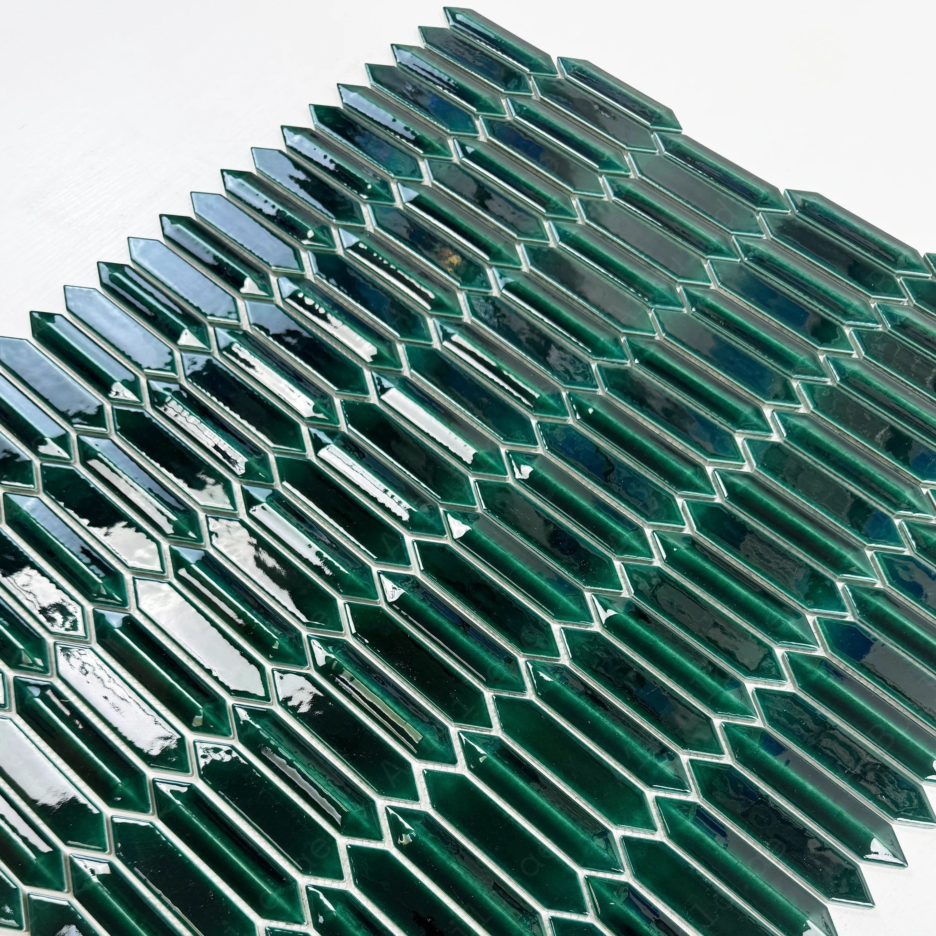 Deep emerald green elongated hexagonal glossy porcelain mosaic, perfect for walls, backsplashes, and interiors with modern, vibrant, and elegant appeal.