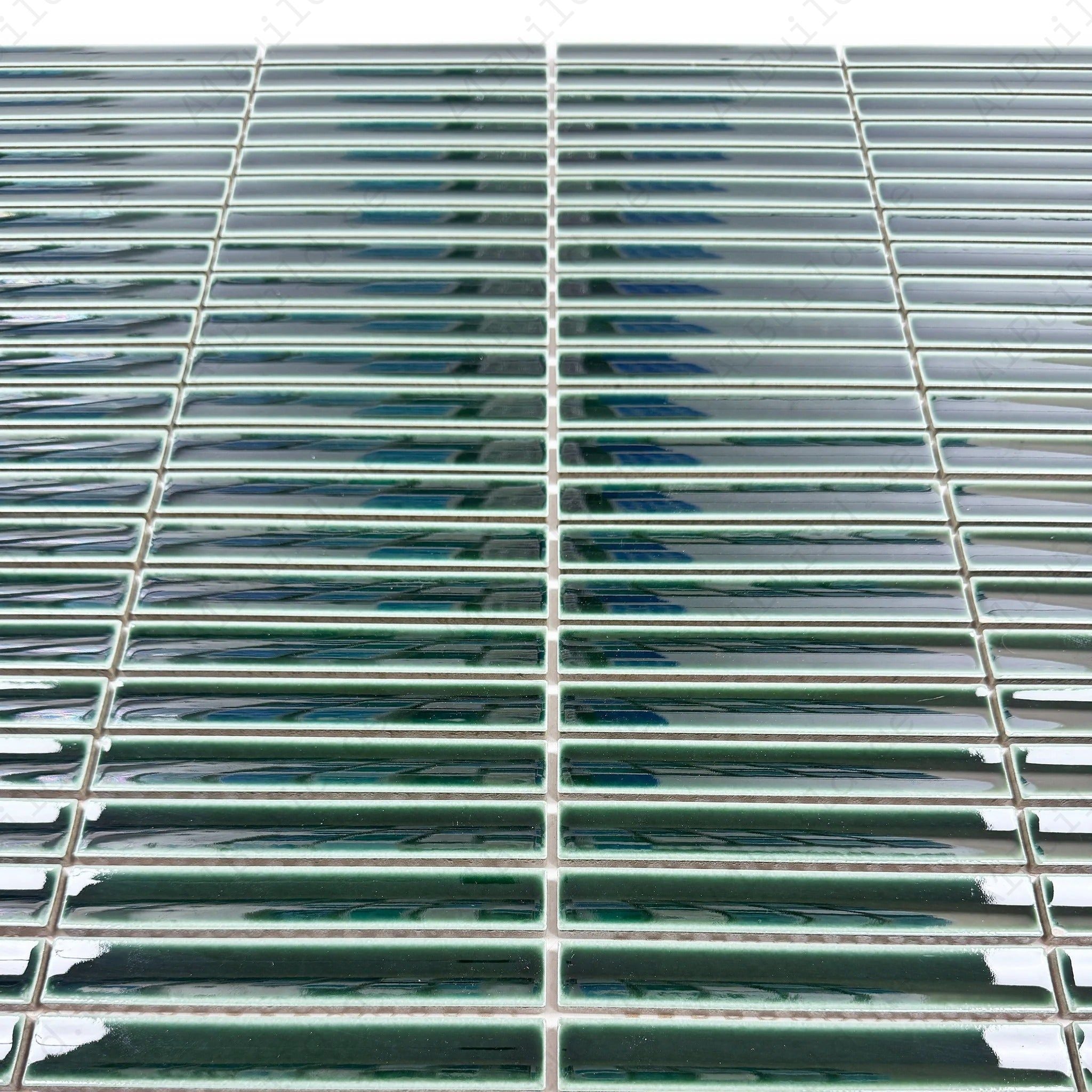 Deep forest green long strip glossy porcelain mosaic adds modern elegance to walls, kitchens, and bathrooms. Durable, moisture-resistant, and easy to install.