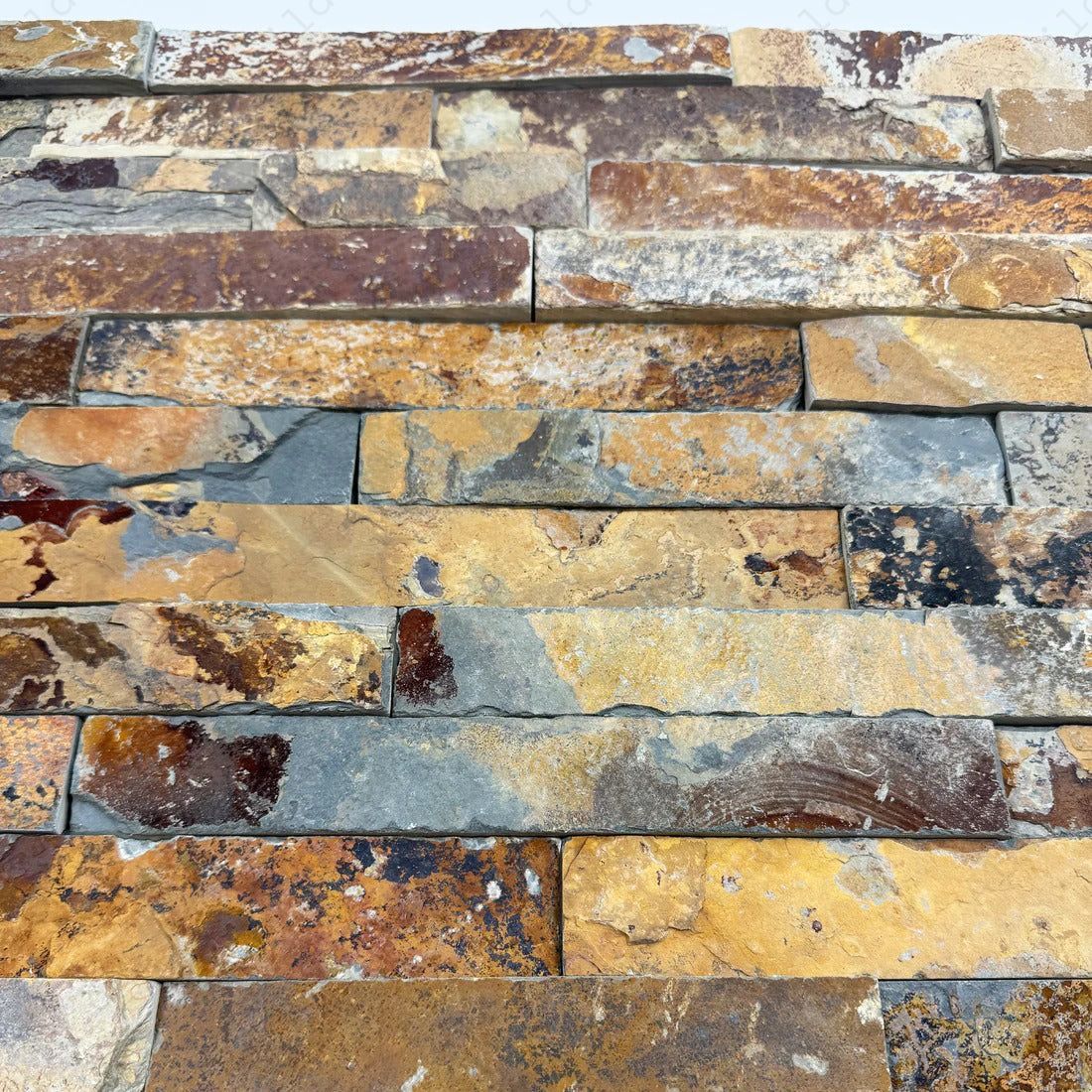 Discover Celestial Terra S1120 Rust Brown Slate Wall Cladding, 150x600 mm durable panels. Perfect for walls, fireplaces & facades. Natural slate stone beauty.