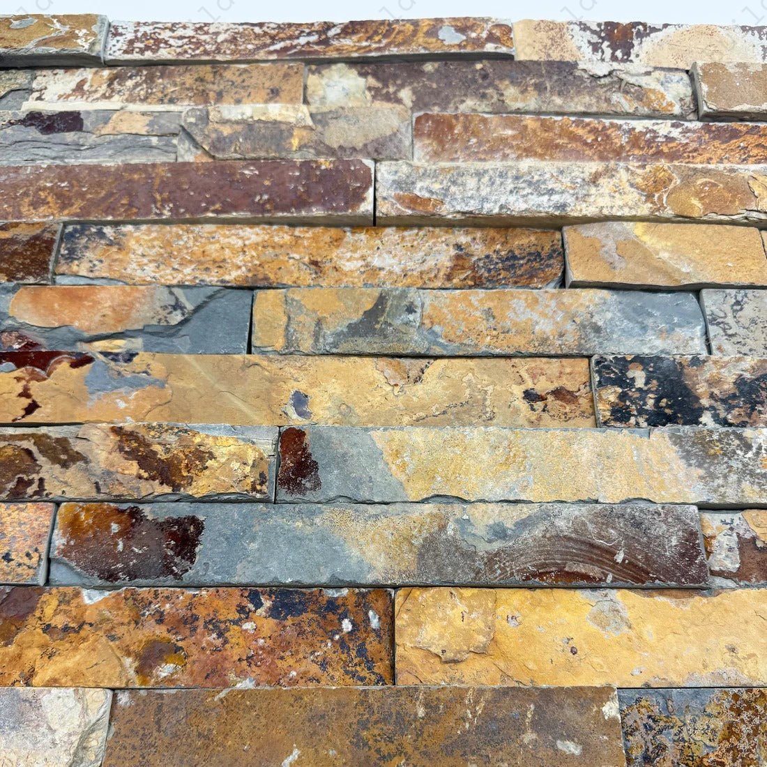 Discover Celestial Terra S1120 Rust Brown Slate Wall Cladding, 150x600 mm durable panels. Perfect for walls, fireplaces & facades. Natural slate stone beauty.
