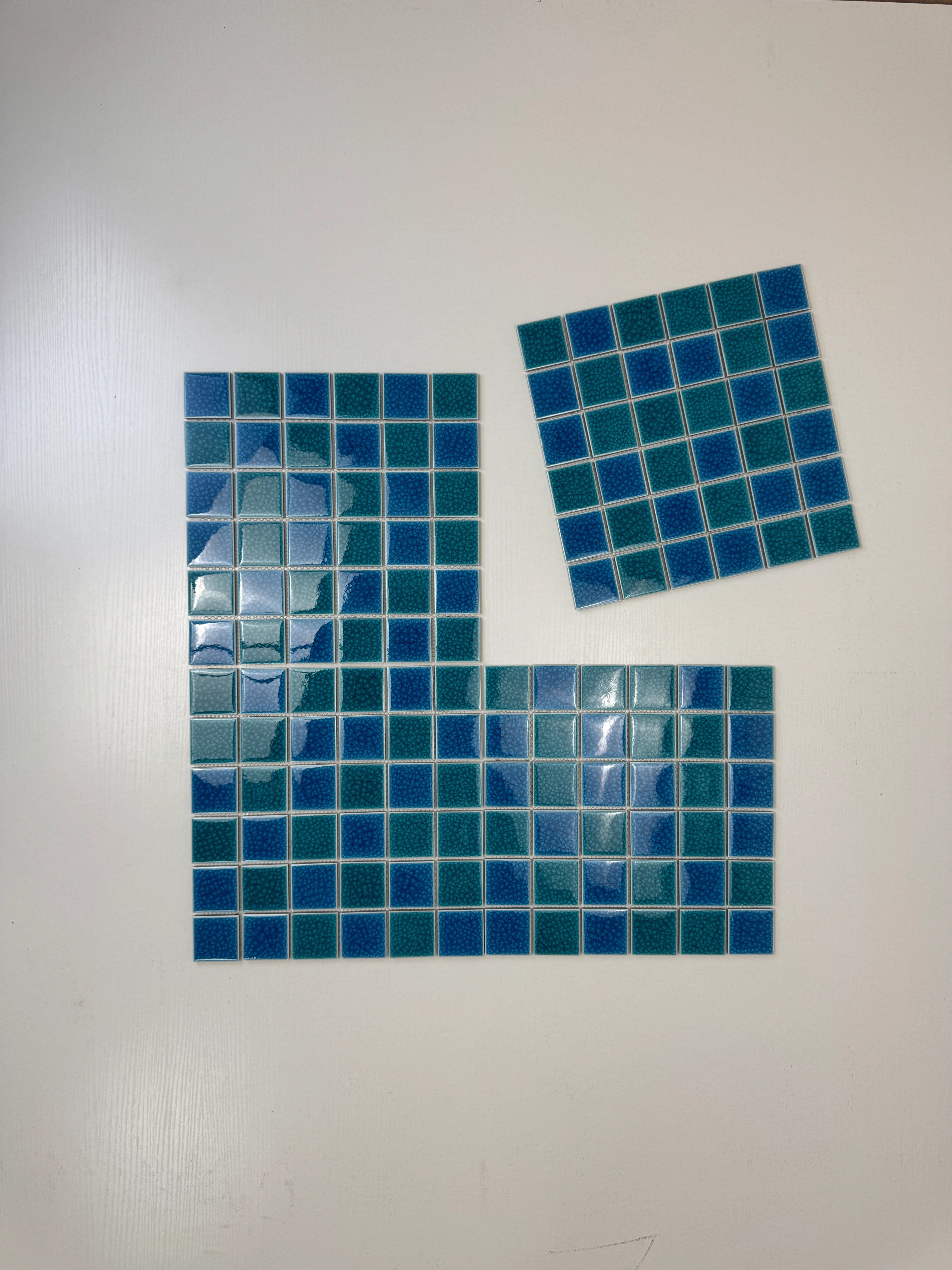 Elegant Tiffany & French Blue double crackle porcelain mosaic tiles. Waterproof, UV-resistant, slip-proof, ideal for luxury pools, spas & water walls.