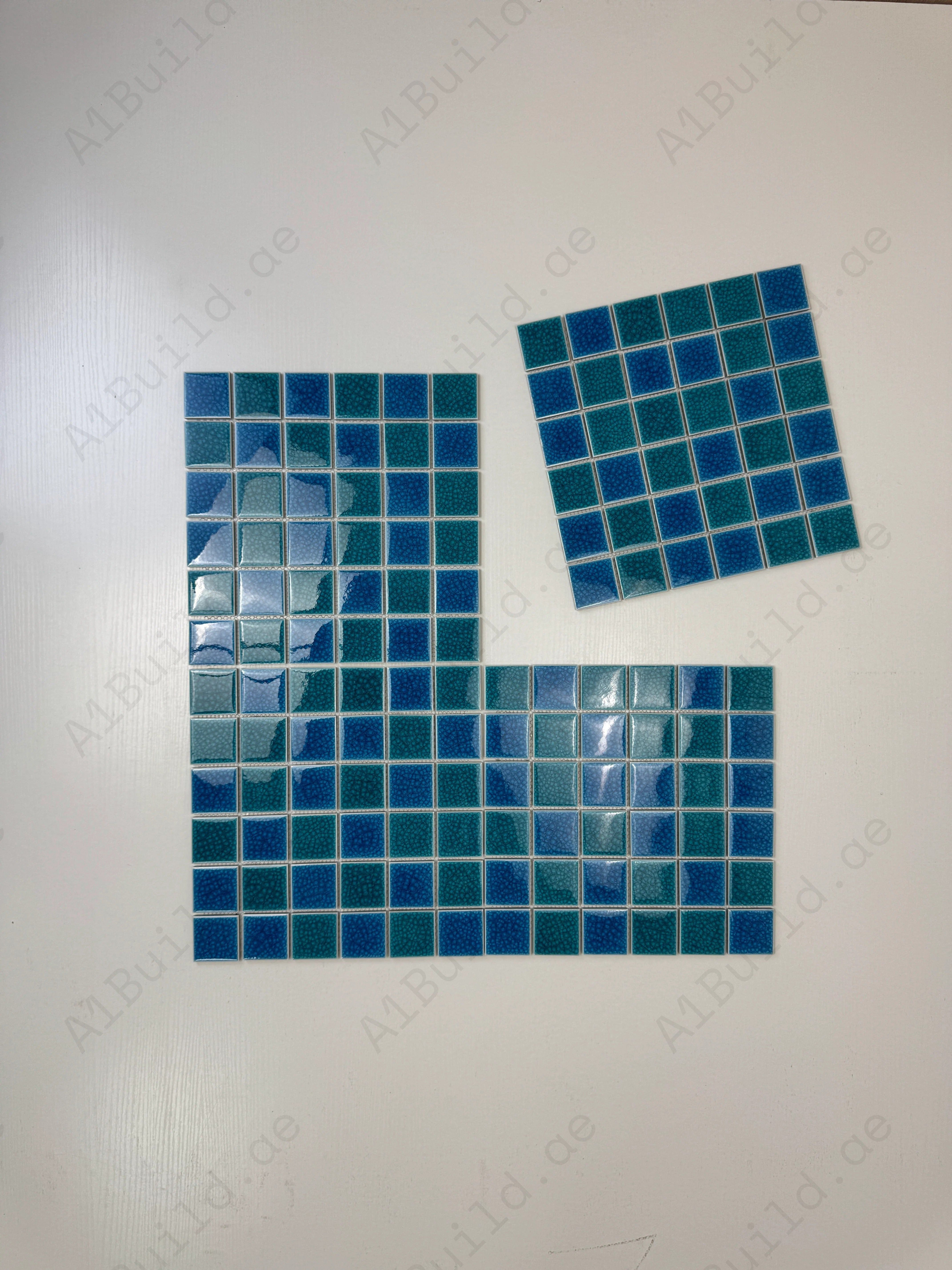 Elegant Tiffany & French Blue double crackle porcelain mosaic tiles. Waterproof, UV-resistant, slip-proof, ideal for luxury pools, spas & water walls.