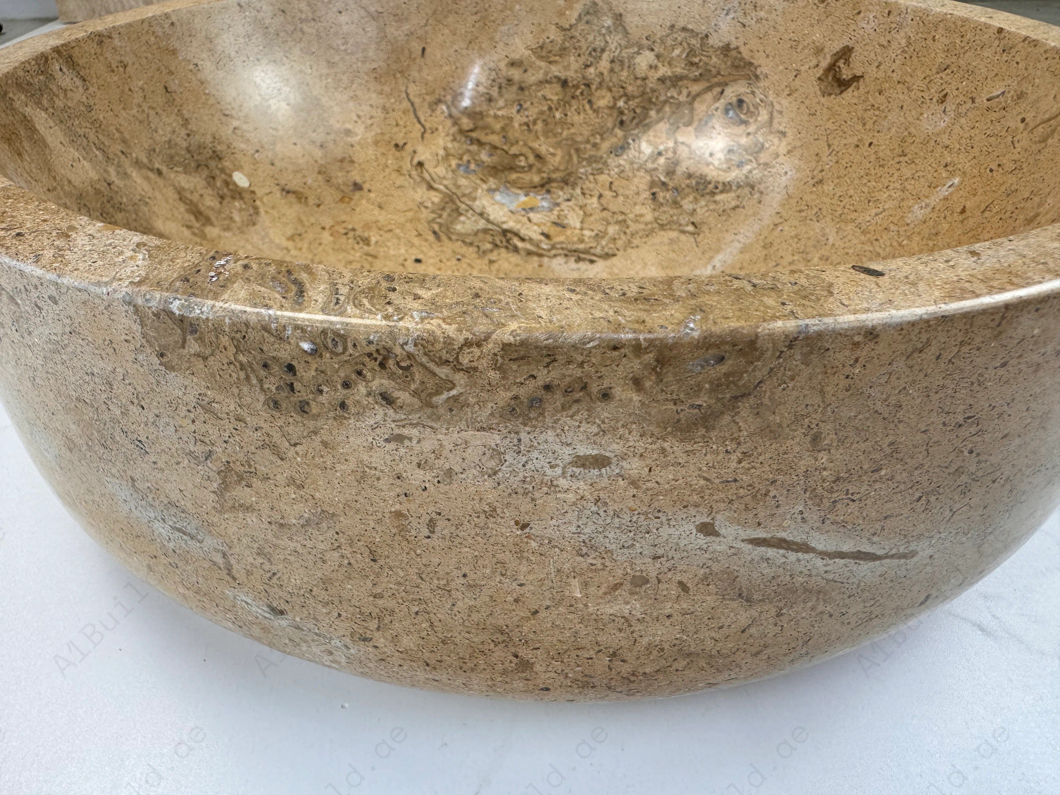 Elevate bathroom spaces with the Marble Muse Classic Beige Bowl Wash Basin, crafted from premium polished marble for timeless luxury, durability, and modern elegance.