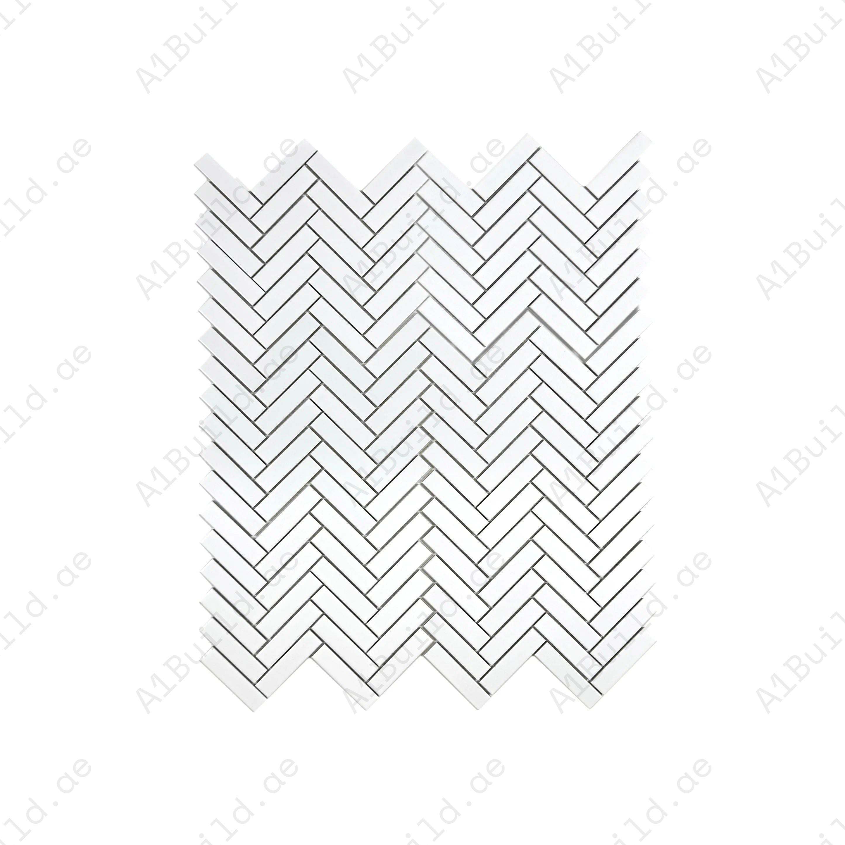 Elevate interiors with Carrara Lumina Pure White Herringbone Porcelain Mosaic. Durable, stylish, and versatile, perfect for walls, backsplashes, and floors.