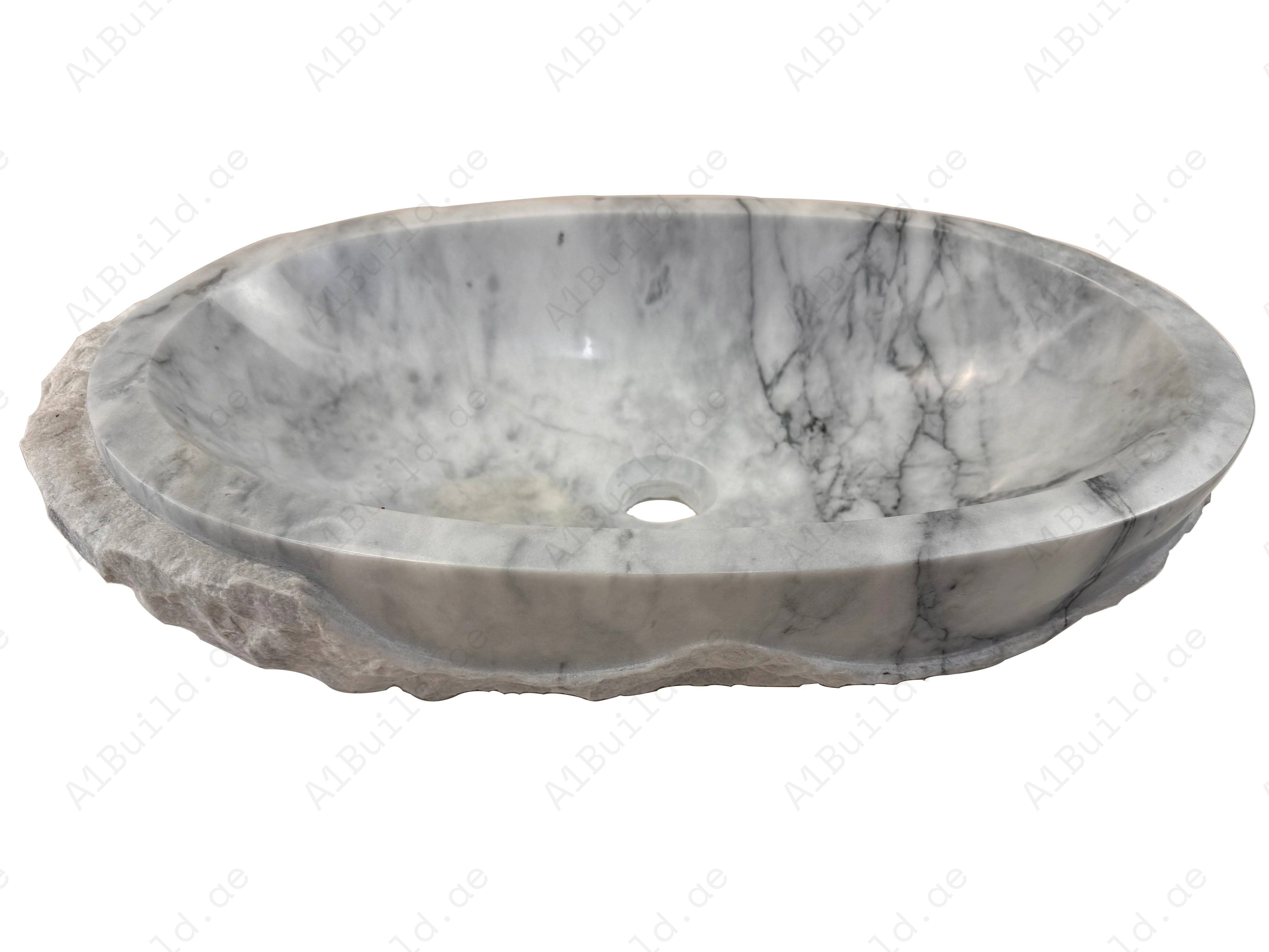 Elevate your bathroom with the Marble Muse Carrara White Natural Elliptical Wash Basin, crafted from premium marble for timeless elegance and lasting beauty.