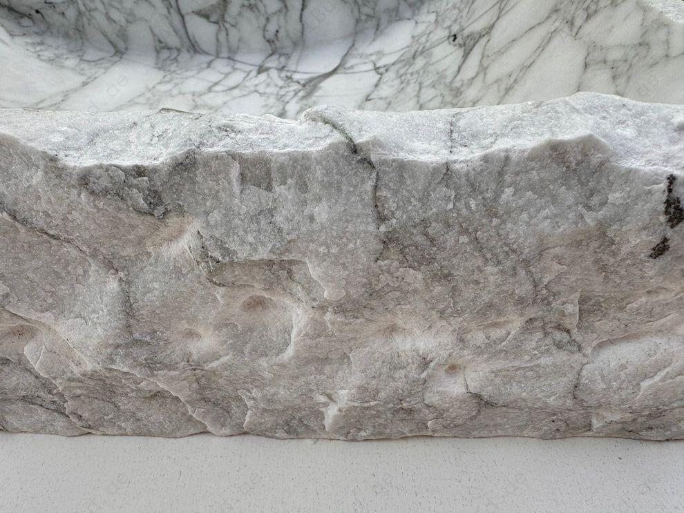 Elevate your bathroom with the Marble Muse Carrara White Rectangle Wash Basin, featuring a natural marble surface, timeless elegance, and refined craftsmanship.