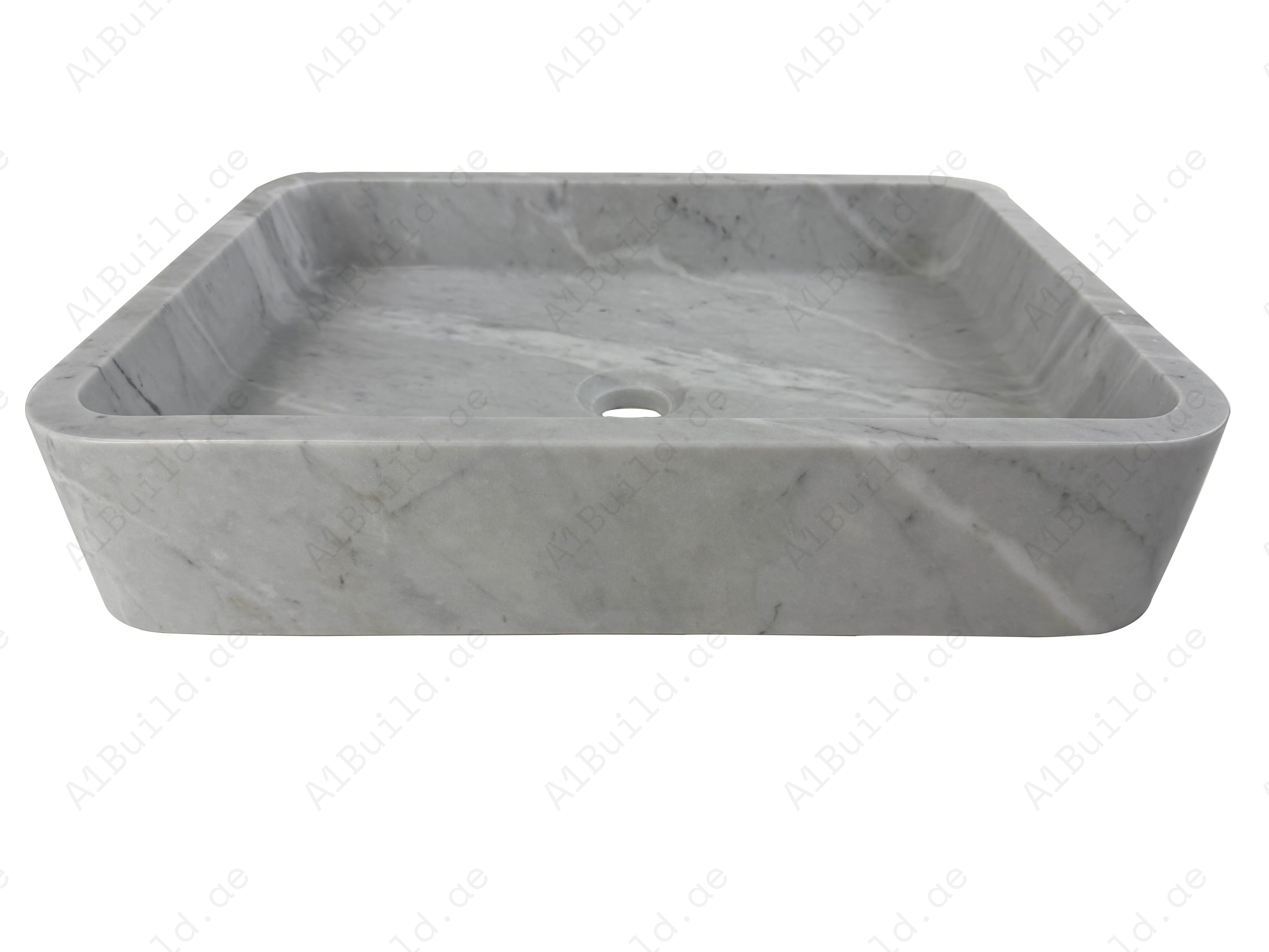 Enhance your bathroom with the Marble Muse Carrara White Polished Rectangle Wash Basin, crafted from premium marble for timeless elegance and lasting style.