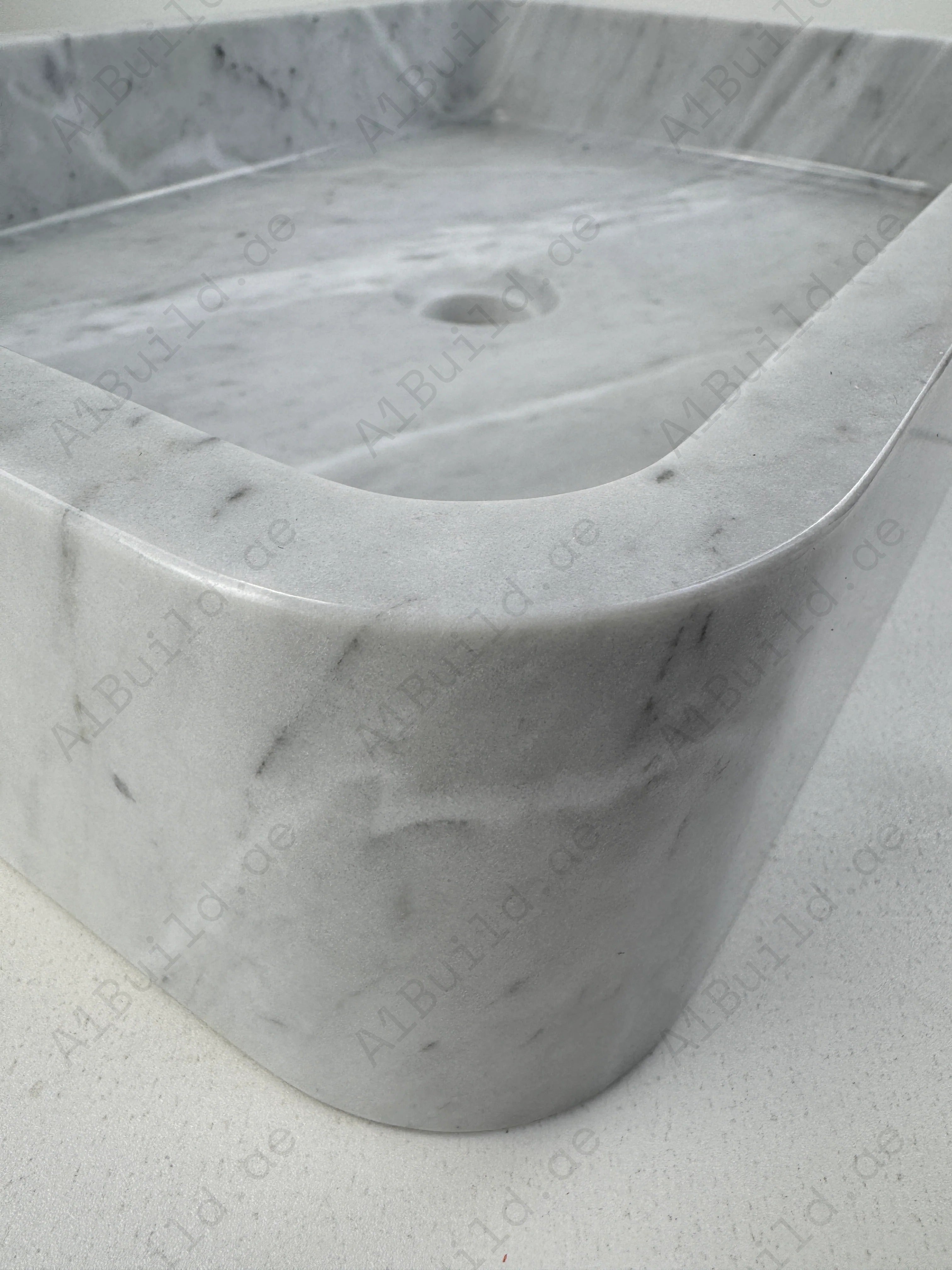 Enhance your bathroom with the Marble Muse Carrara White Polished Rectangle Wash Basin, crafted from premium marble for timeless elegance and lasting style.