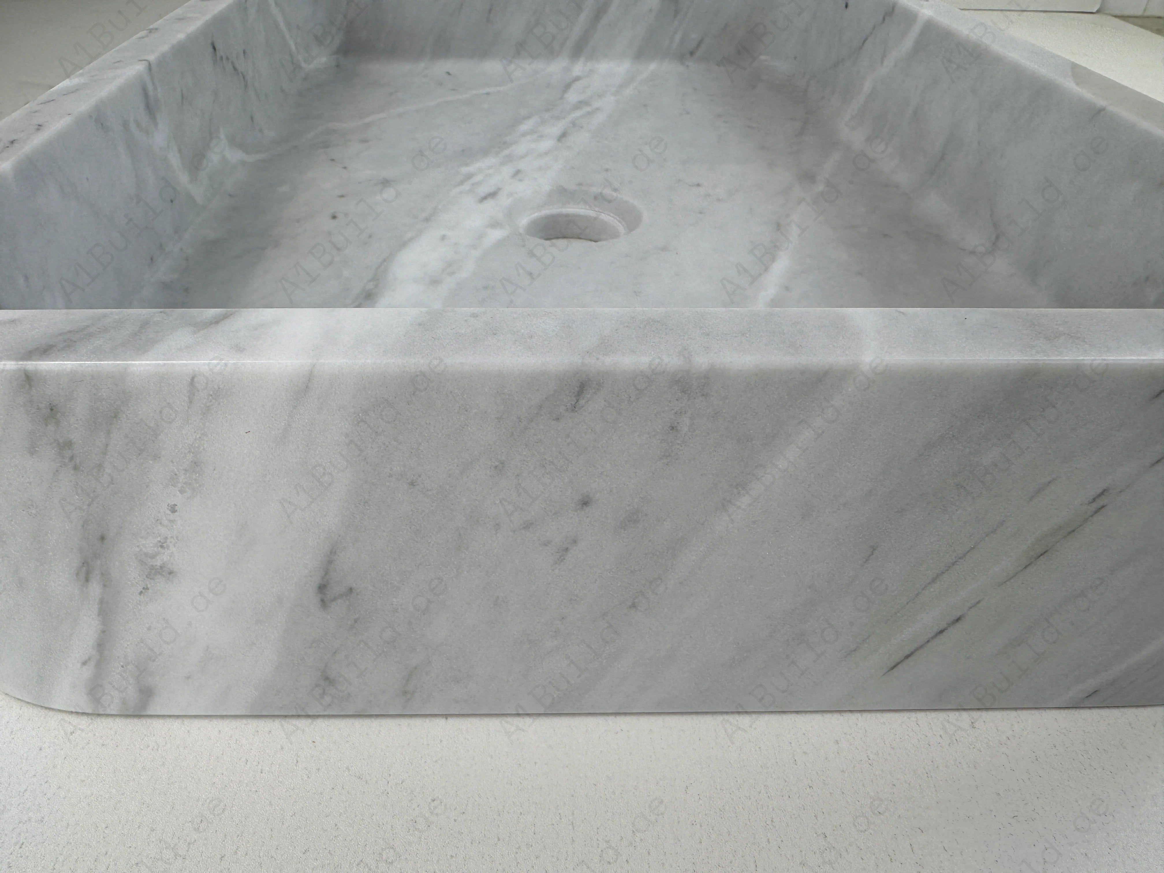 Enhance your bathroom with the Marble Muse Carrara White Polished Rectangle Wash Basin, crafted from premium marble for timeless elegance and lasting style.
