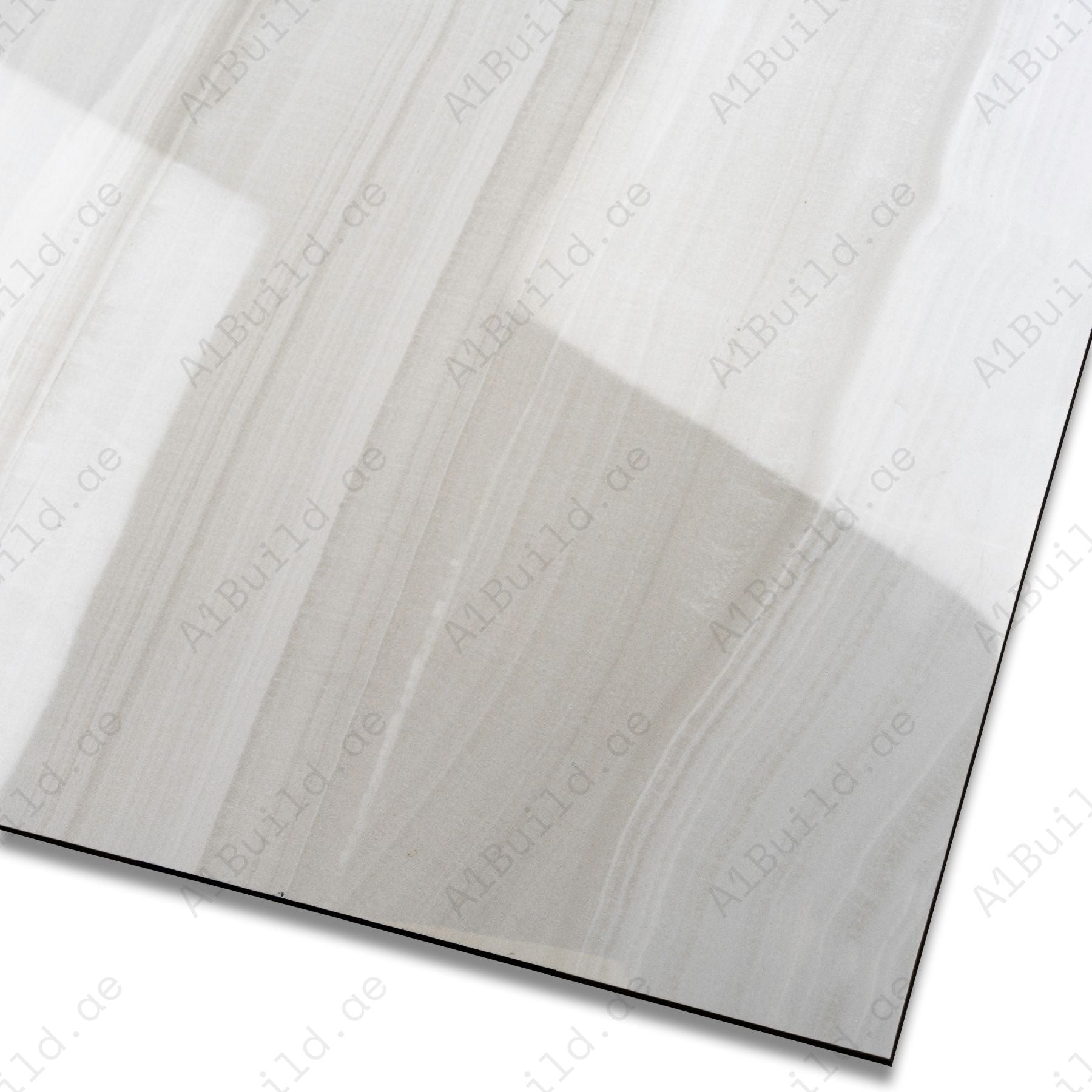 Explore the GLACIER WHITE large format porcelain tile, 60x120cm with a glossy marble-look finish. Durable 9MM porcelain tile ideal for floors and walls, offering elegance, easy installation, and lasting beauty.