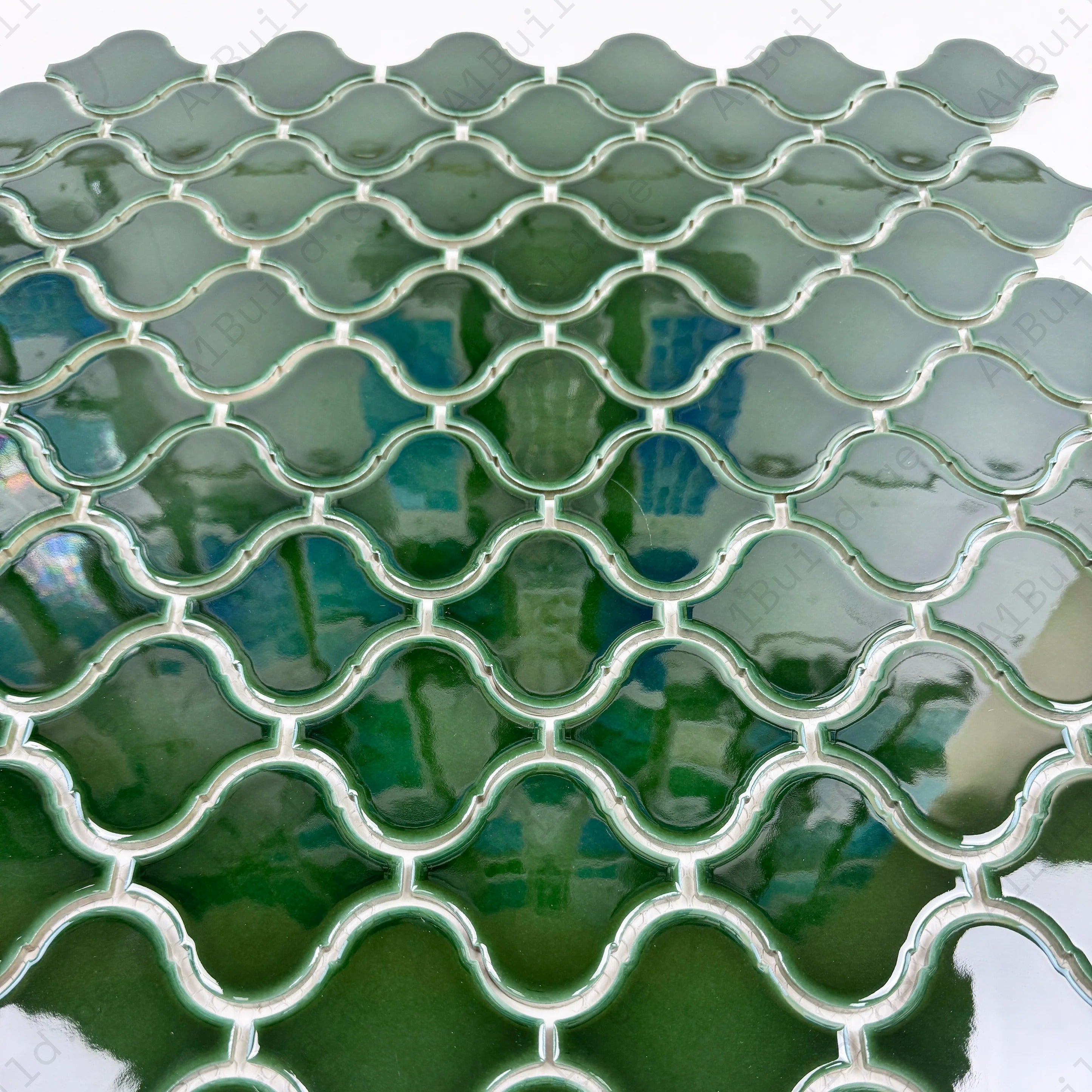 Lantern-inspired emerald green glossy porcelain mosaic. Perfect for walls, backsplashes, and interiors, offering vibrant color, durability, and easy upkeep.