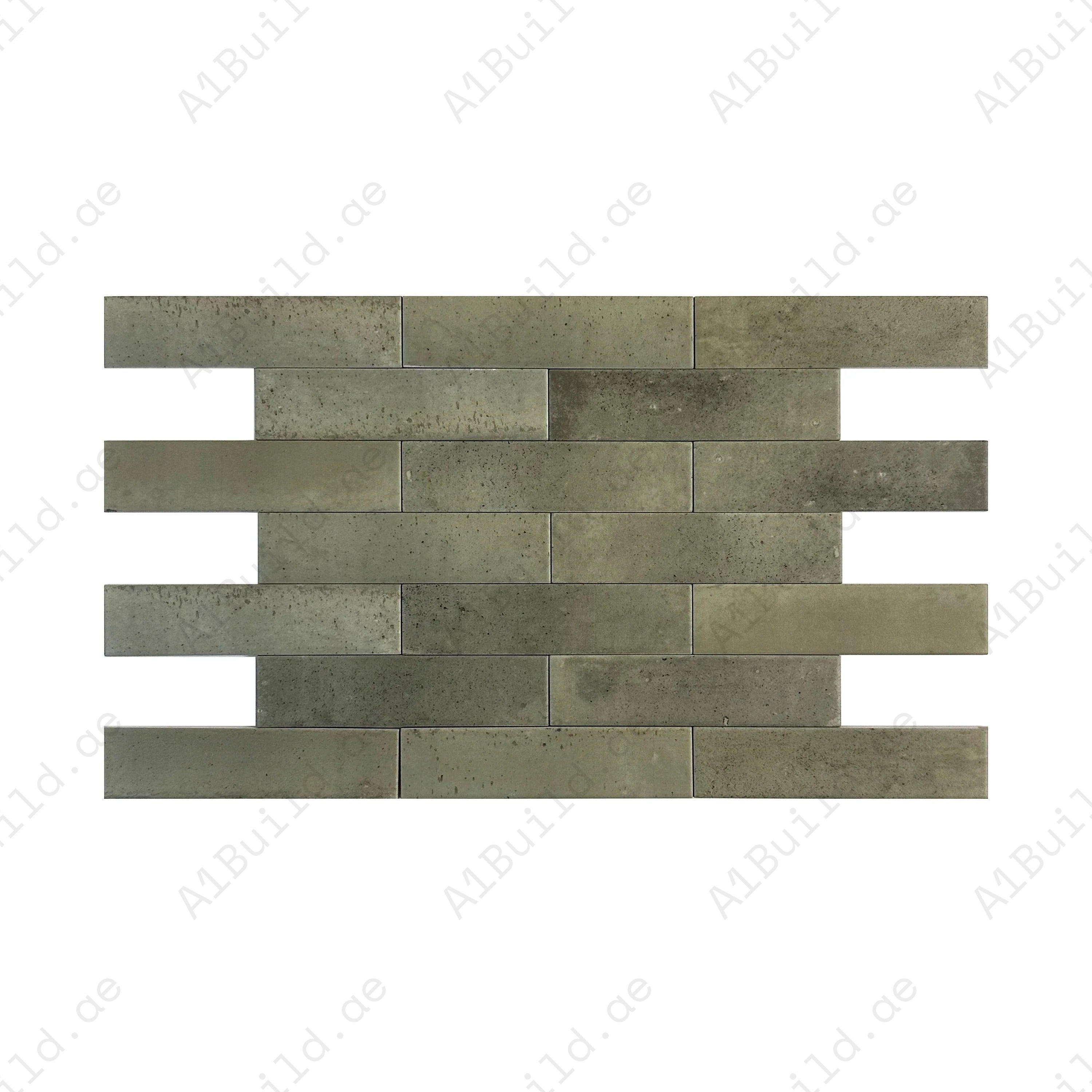 Muted grass green matte porcelain tiles with long-strip design. Durable, waterproof & scratch-resistant. Perfect for walls, floors & kitchen backsplashes.