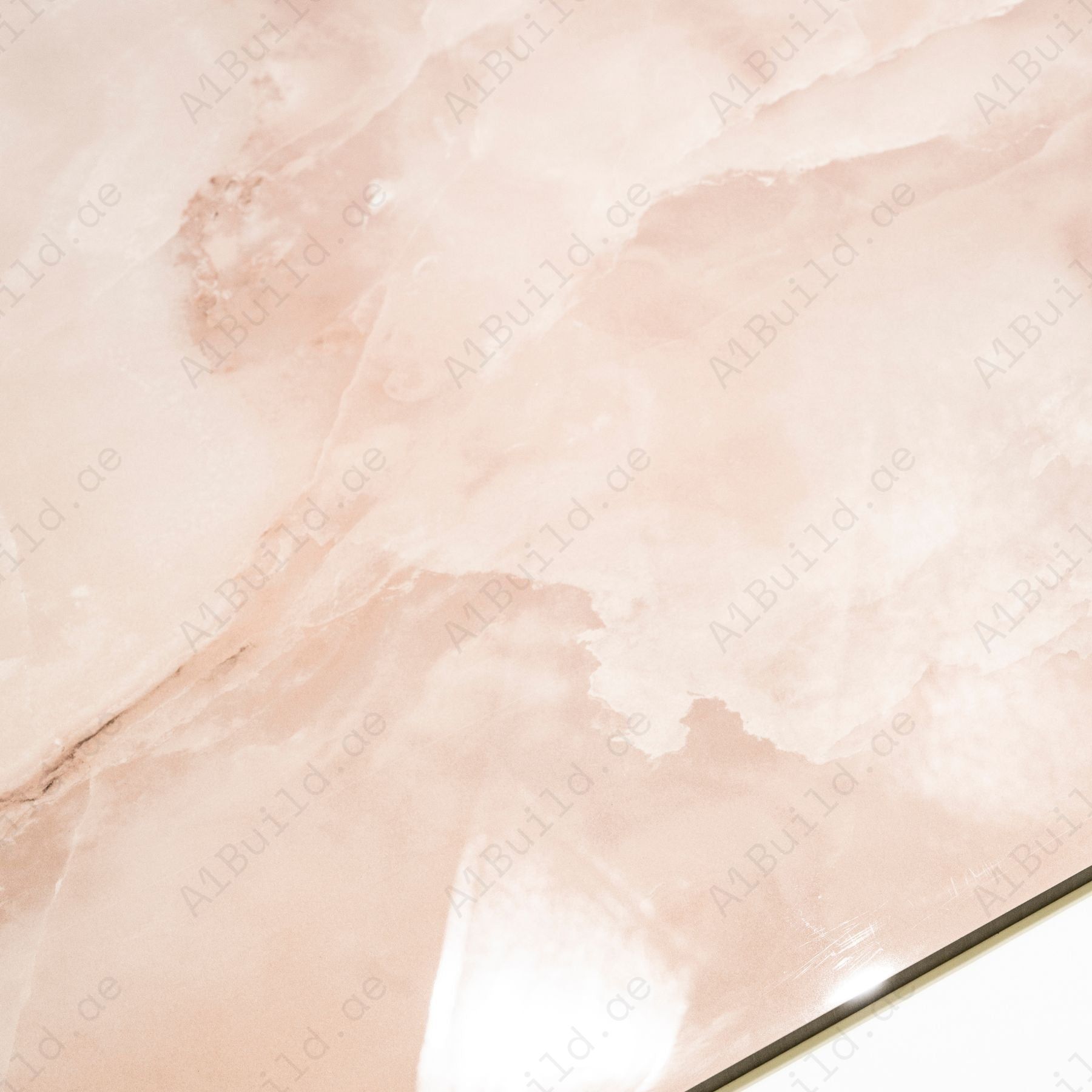 Onyx Rose glossy onyx effect porcelain tile 60x120cm with 9mm thickness features soft rose tones, natural onyx pattern and polished finish.