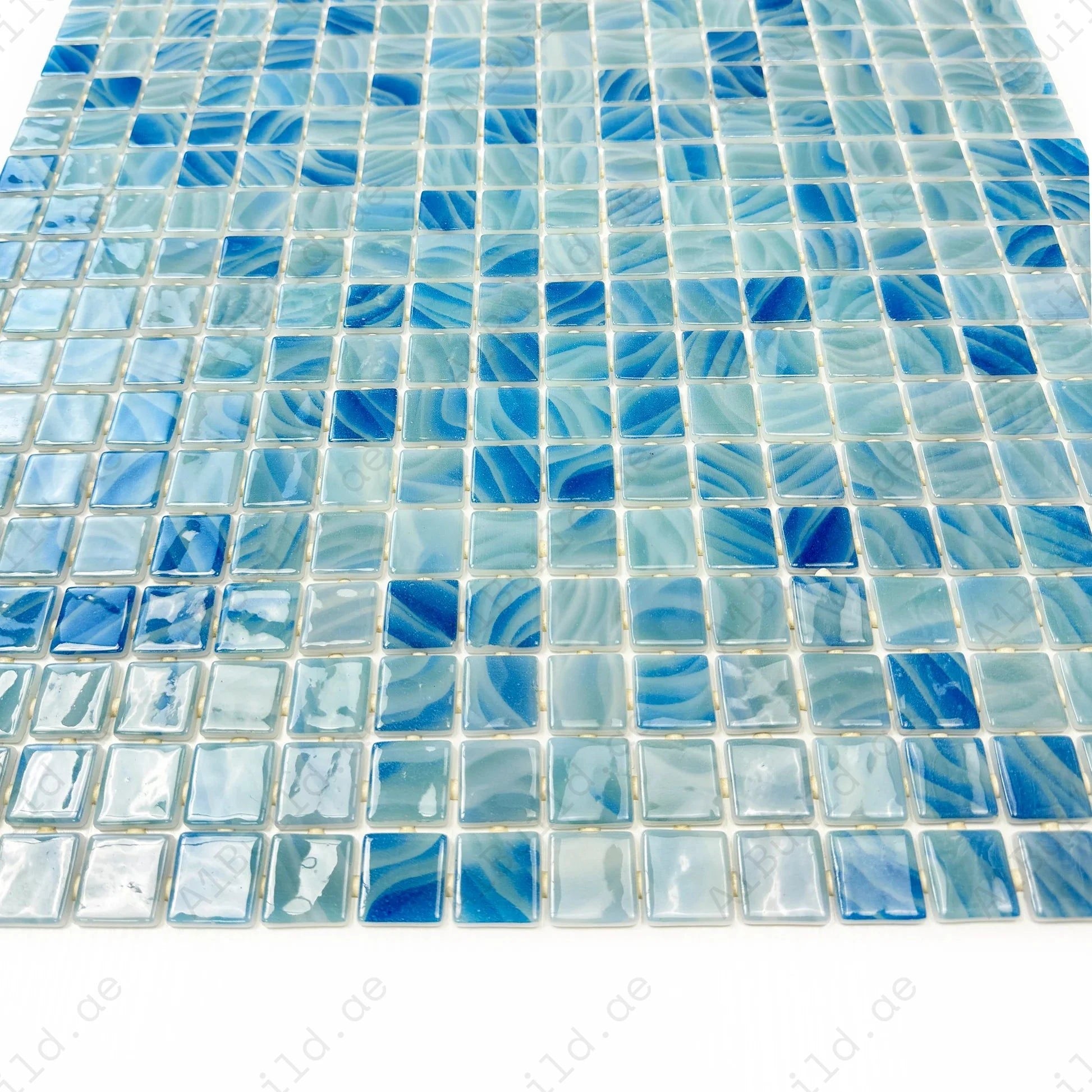 Powder blue & teal recycled glass mosaic tile with shimmering tones. Durable, slip-resistant, UV-proof—ideal for pools, spas, water walls and decorative spaces.