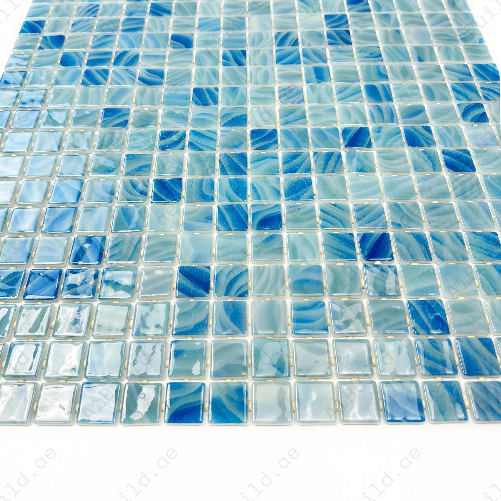Powder blue & teal recycled glass mosaic tile with shimmering tones. Durable, slip-resistant, UV-proof—ideal for pools, spas, water walls and decorative spaces.