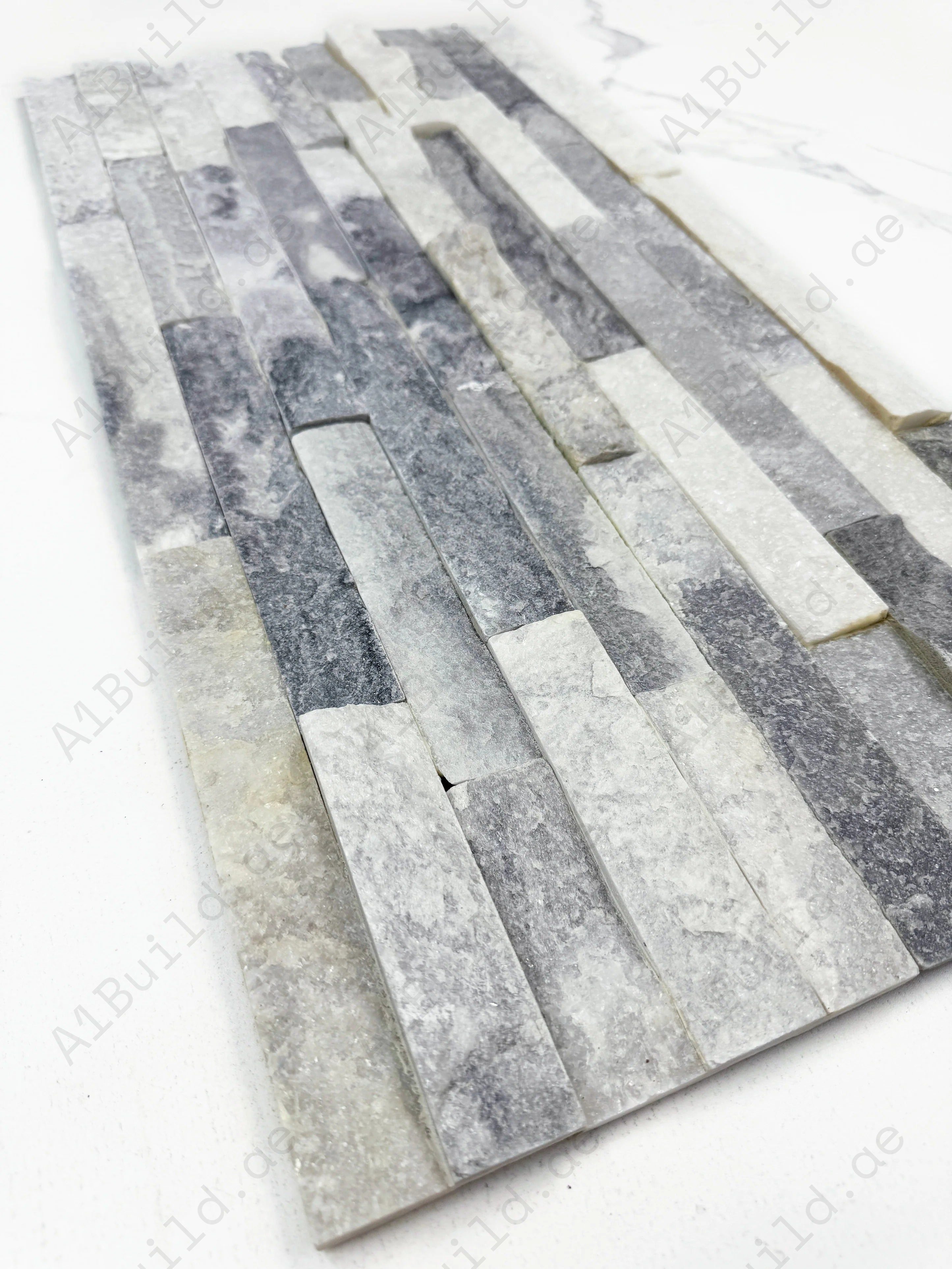 Premium Starlit Quartz White & Pewter Grey Split Marble Wall Cladding. Durable stone finish with rich textures adds elegance, depth, and timeless style.