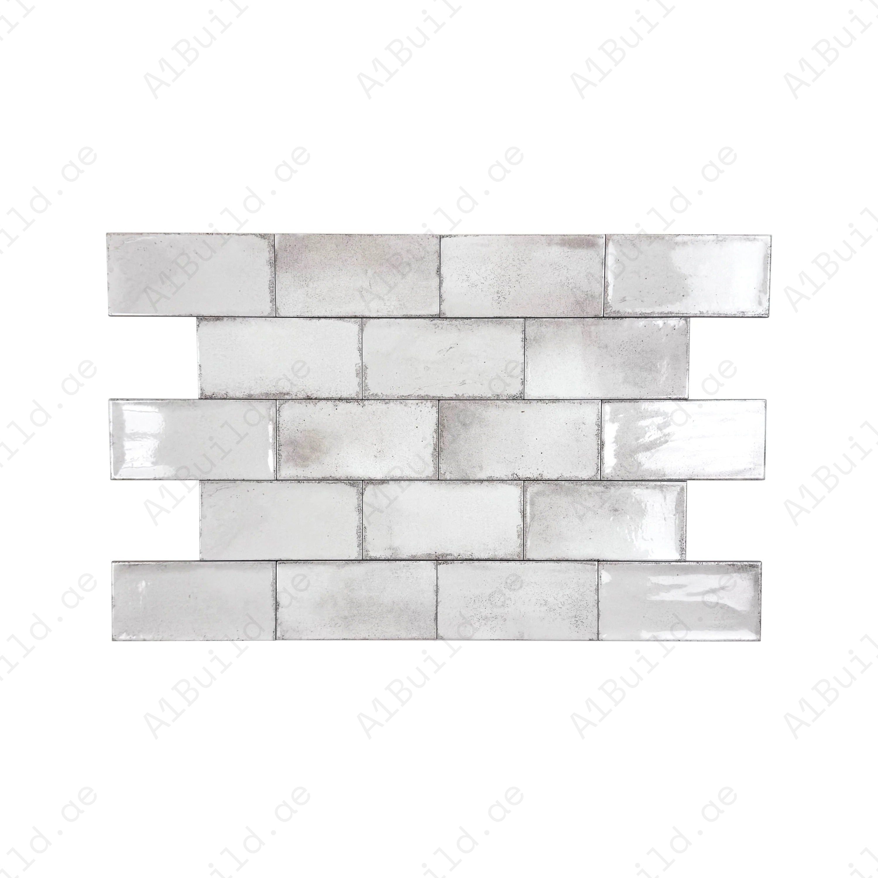 Sandy Beige Glossy Ceramic Tile – Premium long-strip tile with a glossy finish, ideal for elegant walls, kitchens, bathrooms, and modern living spaces.