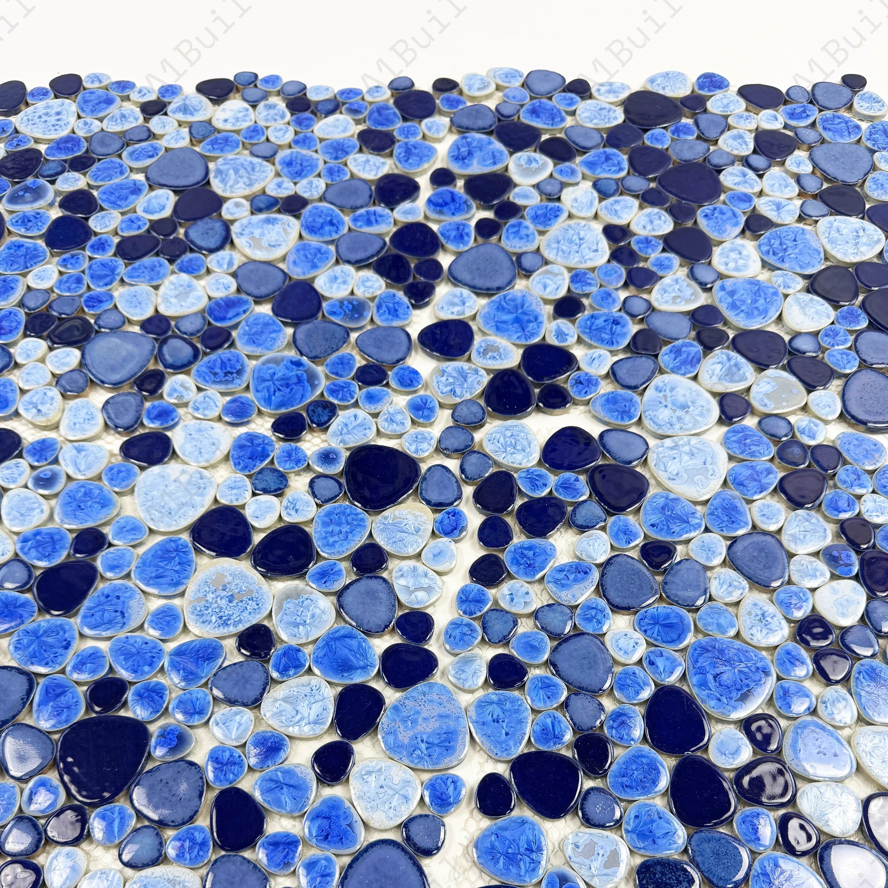 Sky, royal, and midnight blue round ice crack porcelain mosaic for walls, bathrooms, and kitchens. Durable, water-resistant, and ideal for modern interiors.