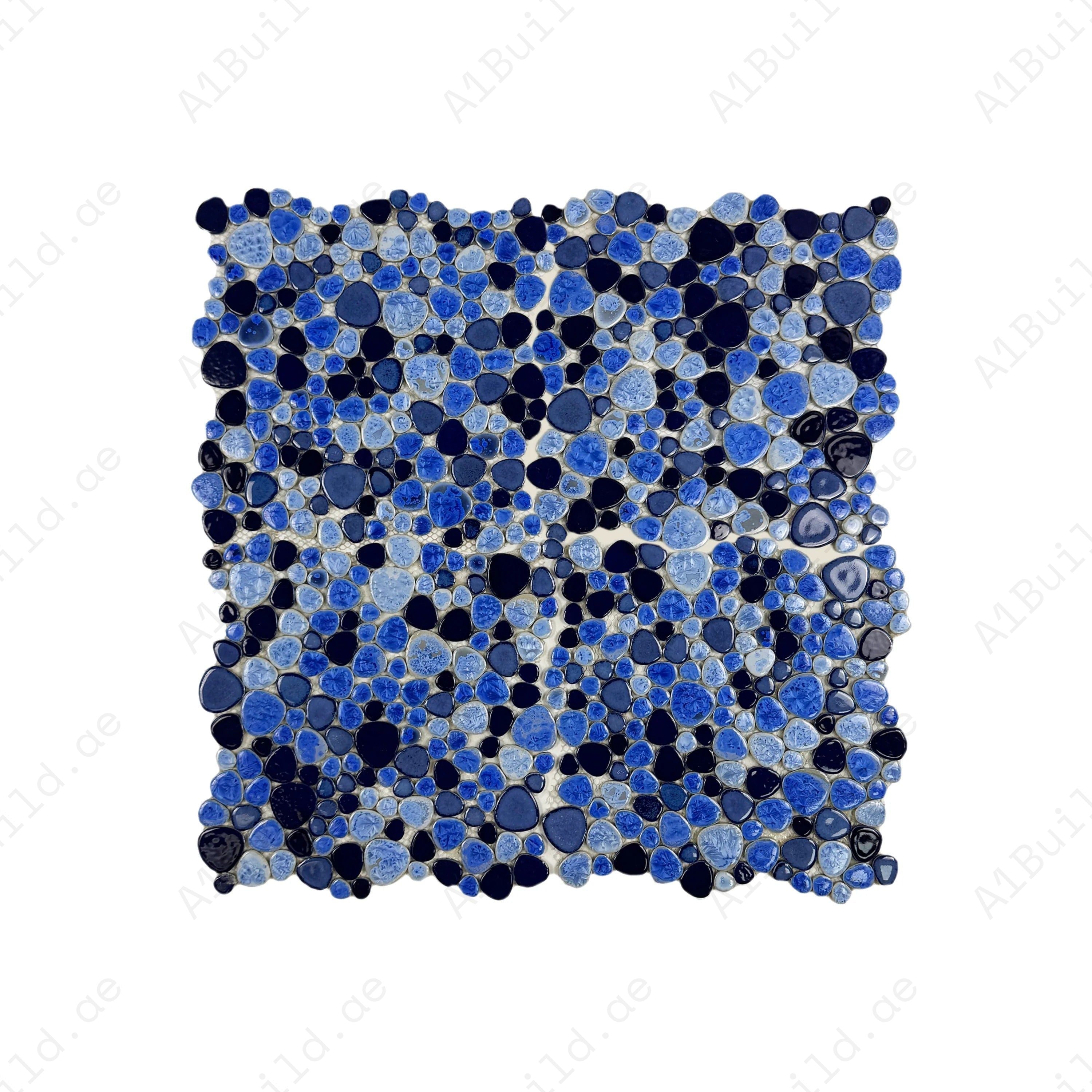 Sky, royal, and midnight blue round ice crack porcelain mosaic for walls, bathrooms, and kitchens. Durable, water-resistant, and ideal for modern interiors.