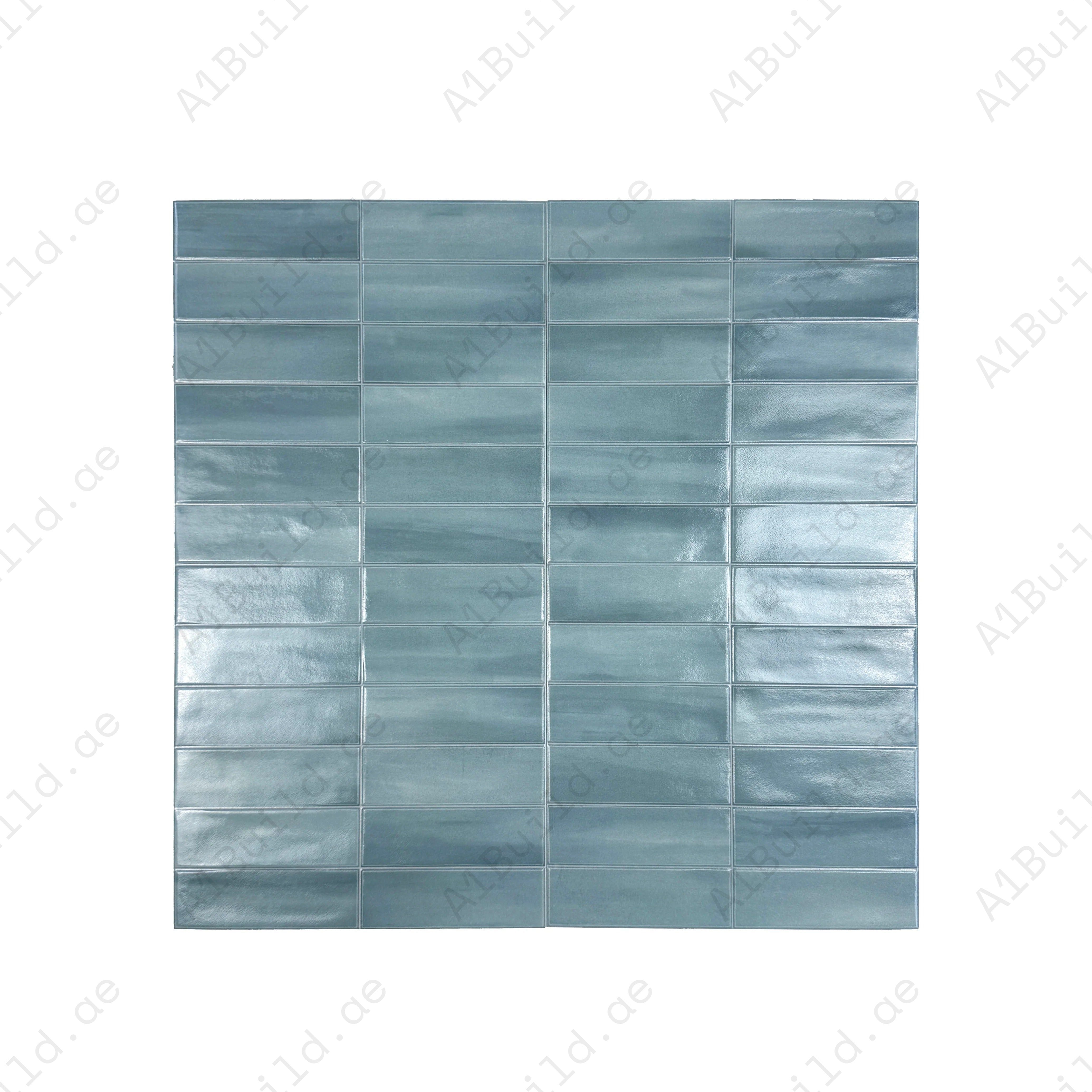 Soft Green glossy ceramic tile with elegant long-strip design. Durable, waterproof, and stain-resistant—ideal for walls, floors, kitchens & bathrooms.