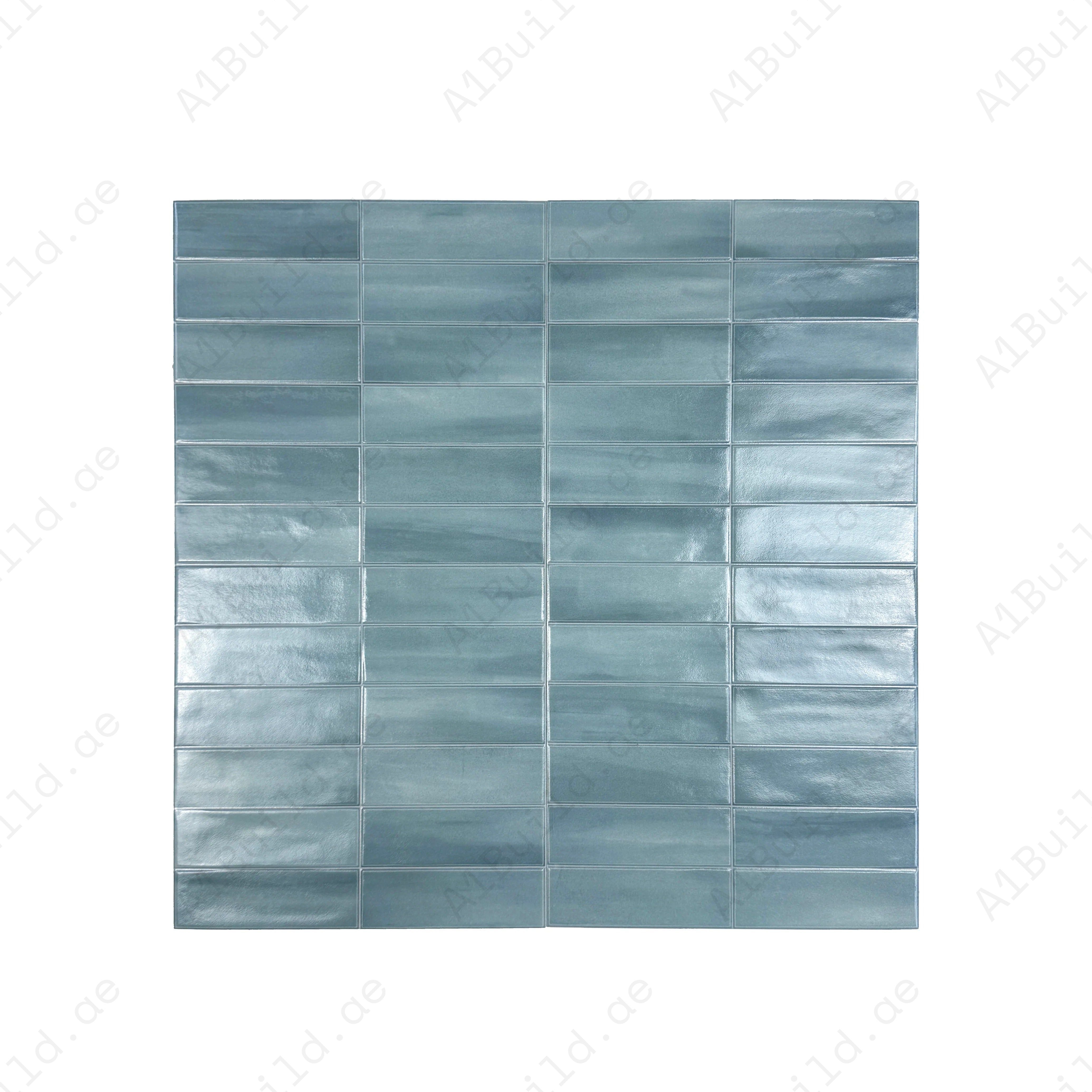 Soft Green glossy ceramic tile with elegant long-strip design. Durable, waterproof, and stain-resistant—ideal for walls, floors, kitchens & bathrooms.