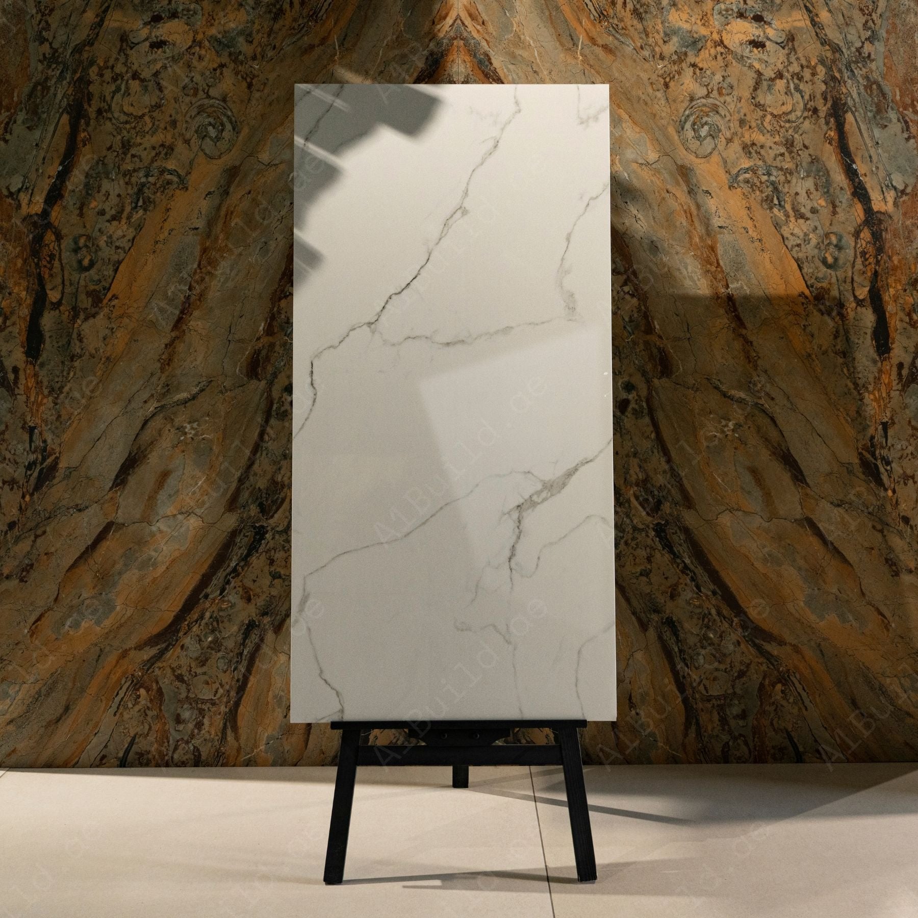 Statuario Ocean glossy marble effect porcelain tile 60x120cm with 9mm thickness features white base, soft grey veining, subtle ocean tones and polished finish.