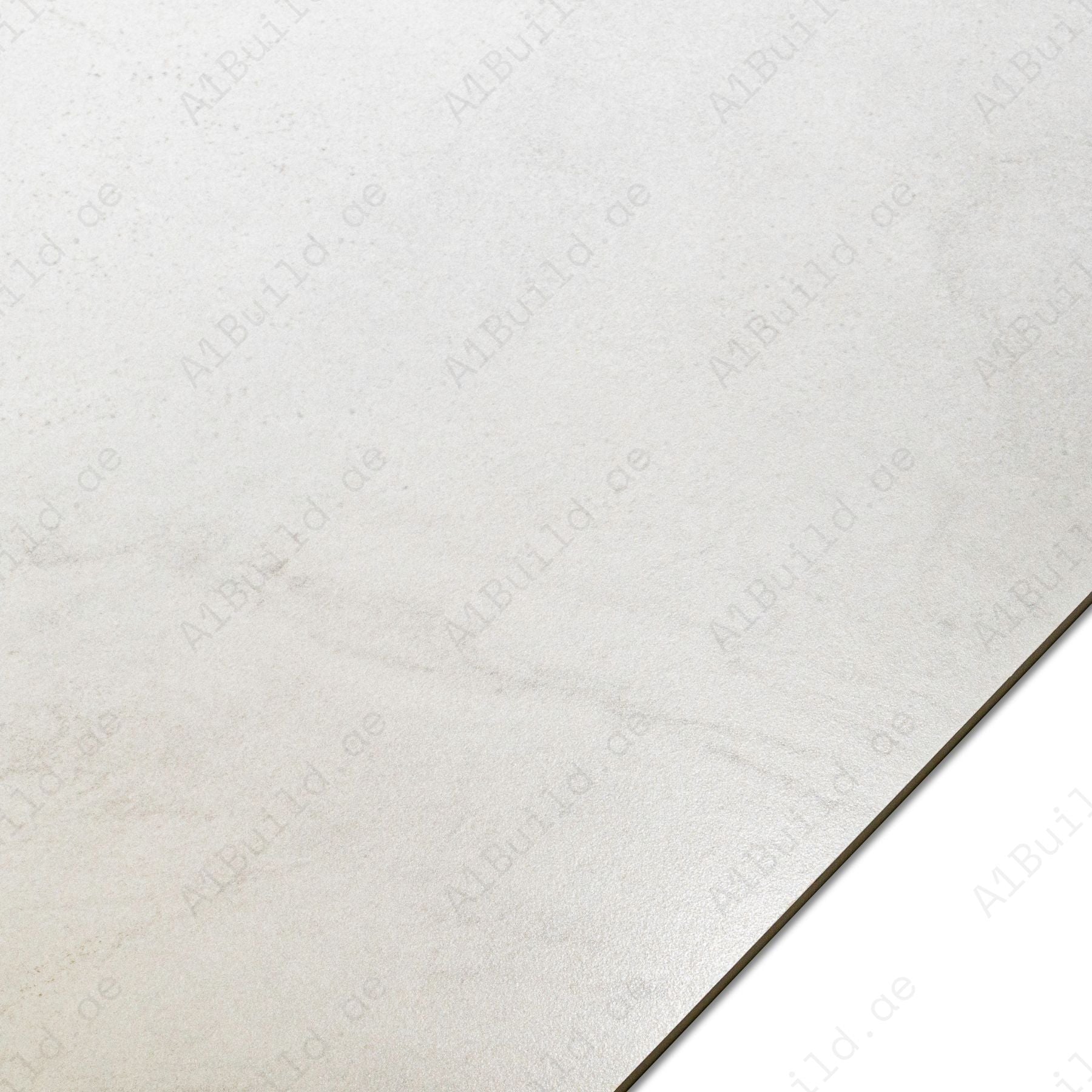 Torrent Silver porcelain tile features a modern silver concrete finish in 60x120cm size offering durability, low maintenance & elegant design for floors & walls.