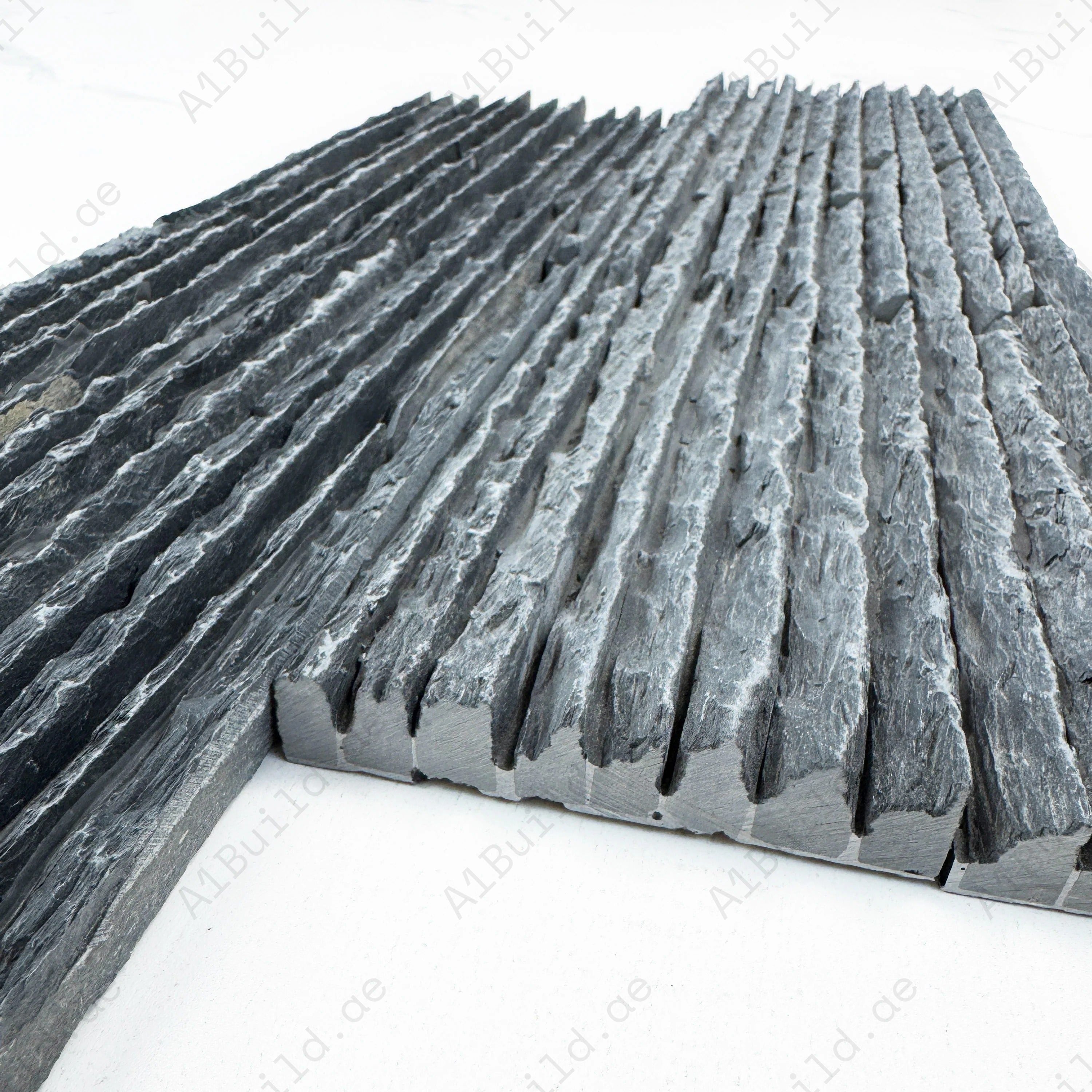 Transform interiors with Twilight Stream Black Peak Stone Slate Wall Cladding. Durable, natural stone texture for feature walls, facades, and modern designs.