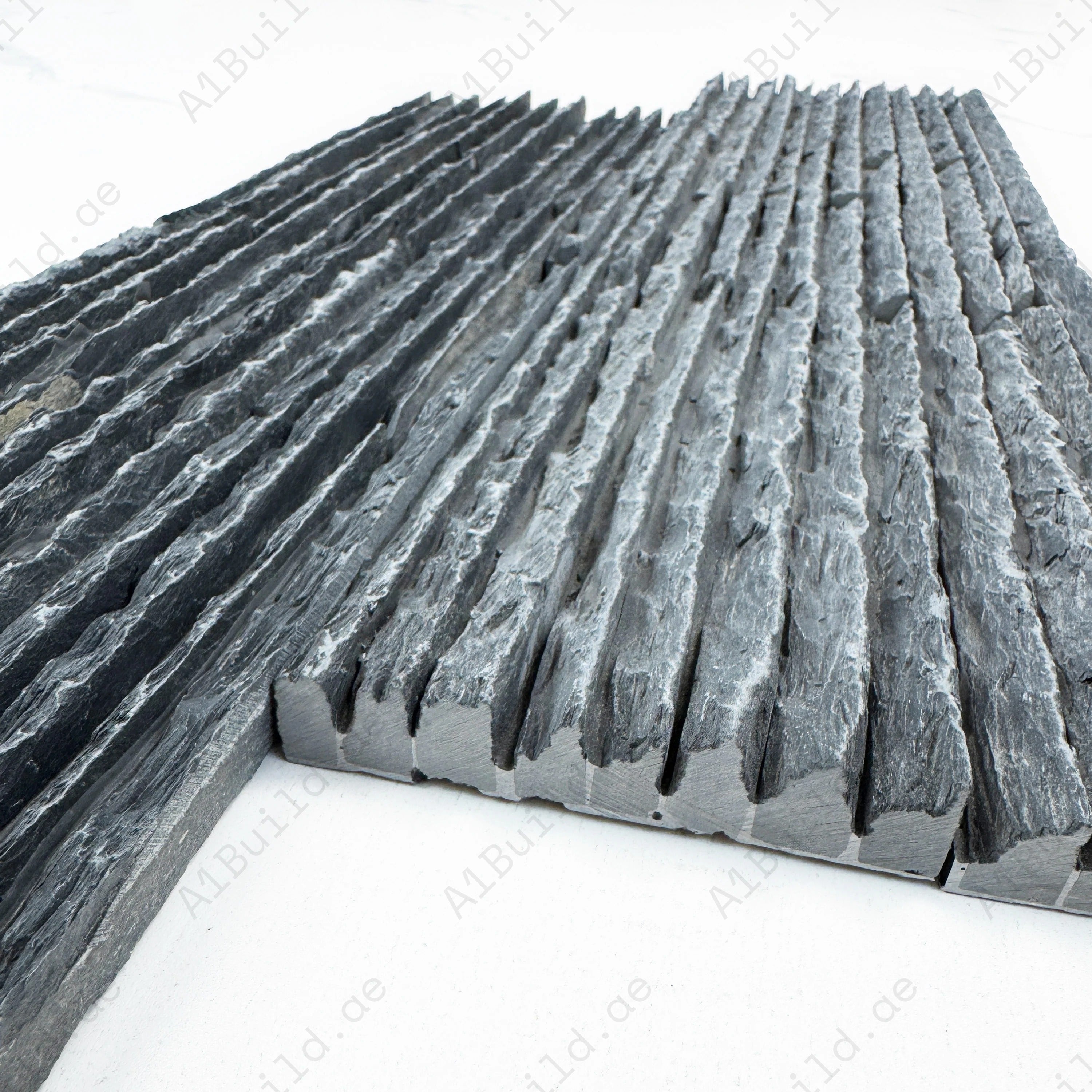 Transform interiors with Twilight Stream Black Peak Stone Slate Wall Cladding. Durable, natural stone texture for feature walls, facades, and modern designs.