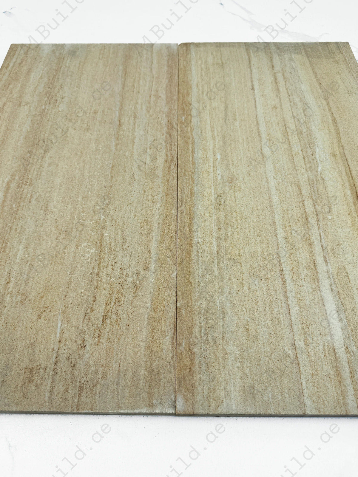 Transform outdoor spaces with Garden Stone Teakwood Honed Sandstone Tile blending natural beauty, durability & smooth texture for patios, pathways & landscapes.