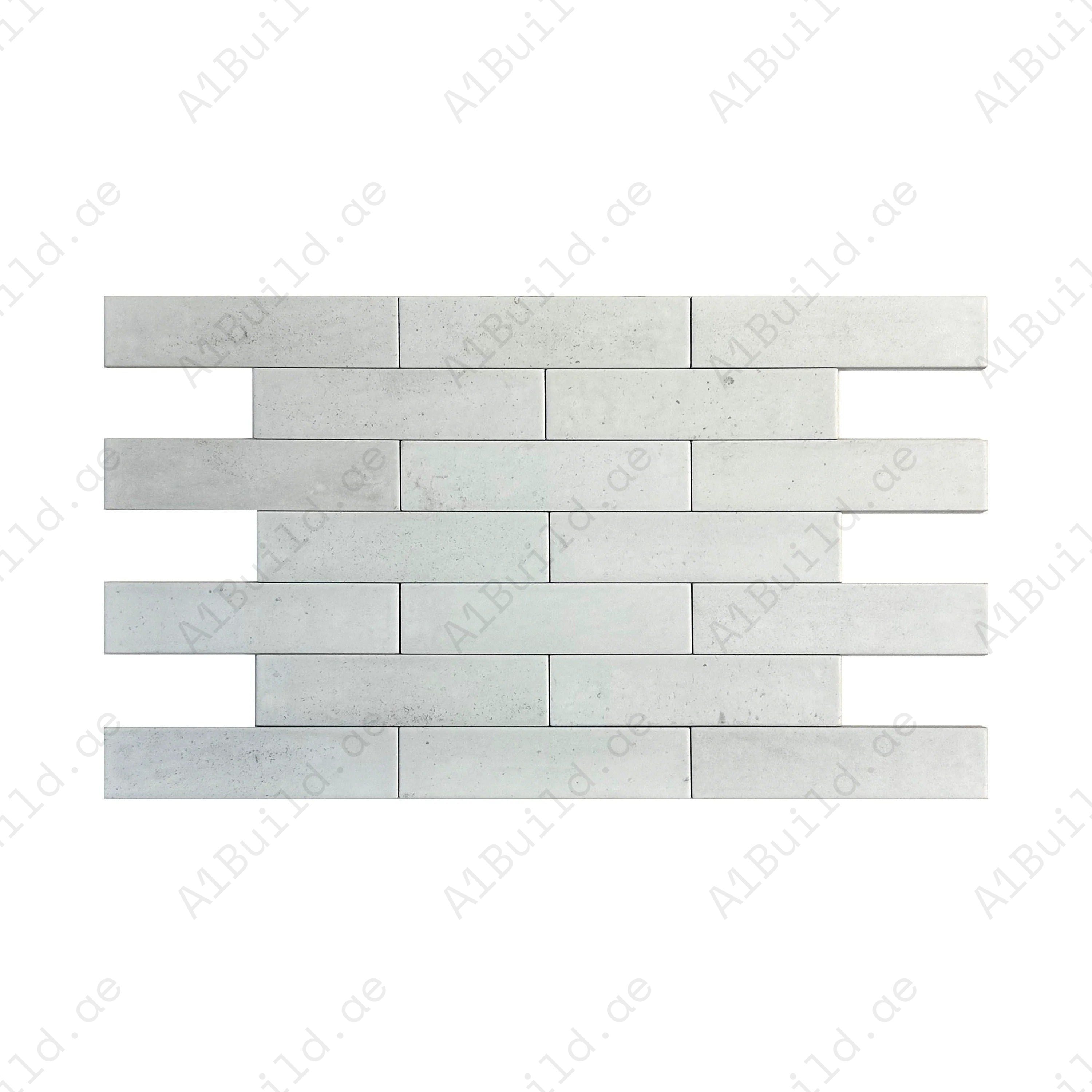 Upgrade interiors with White Matte Porcelain Artisanal Tile. Durable, water-resistant, and stylish long-strip design for walls, floors, kitchens, and bathrooms.
