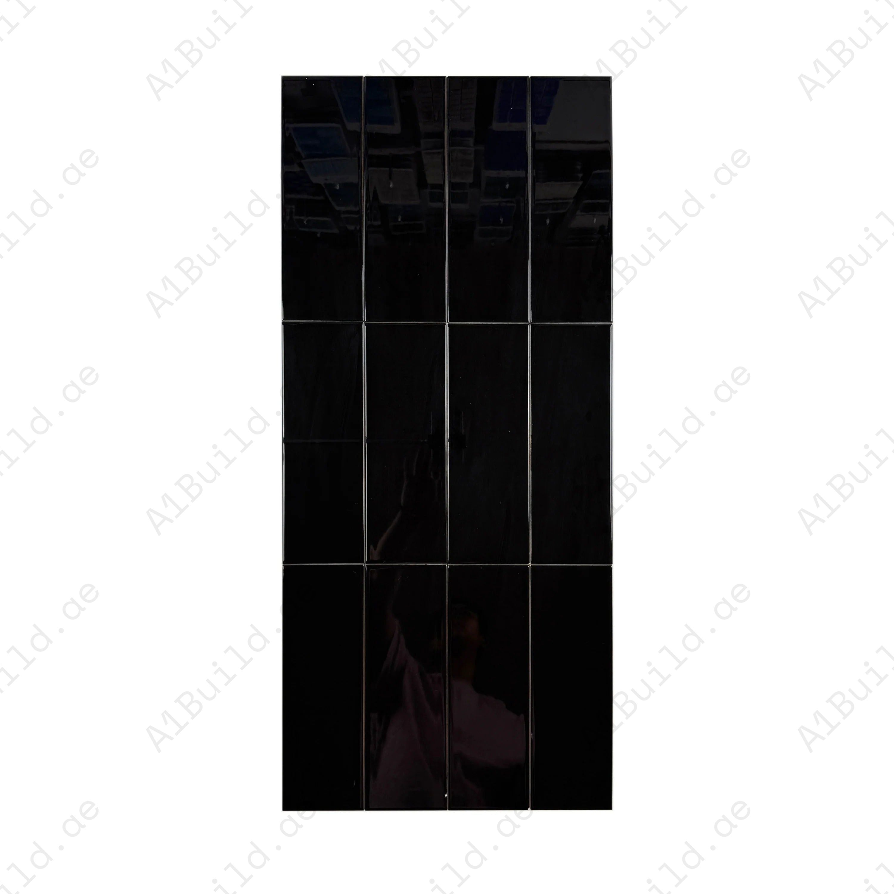 Upgrade interiors with the Urban Luxe Black Glossy Flat Ceramic Tile (100x300mm). Perfect for walls, kitchens, and bathrooms, durable with a sleek shine.