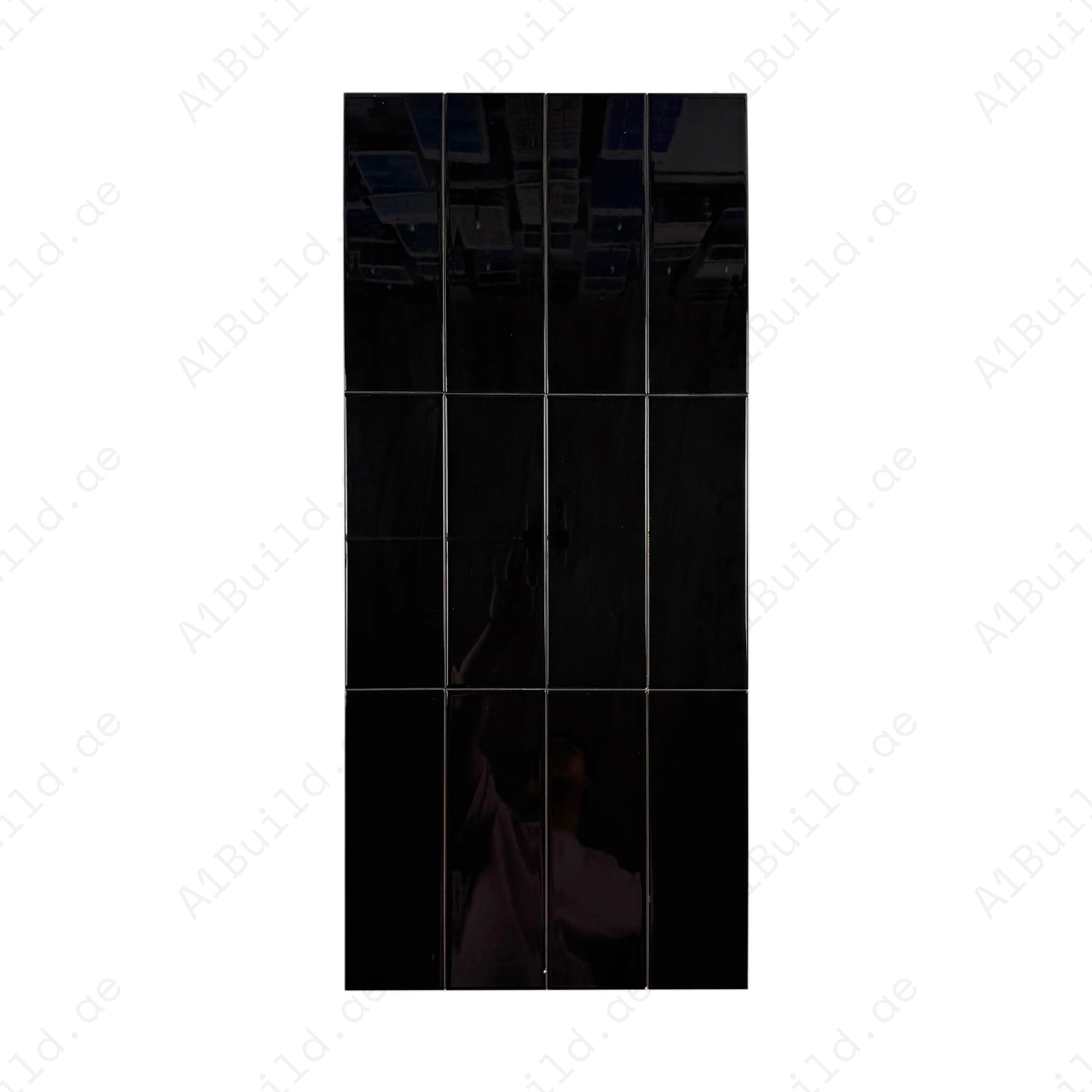 Upgrade interiors with the Urban Luxe Black Glossy Flat Ceramic Tile (100x300mm). Perfect for walls, kitchens, and bathrooms, durable with a sleek shine.
