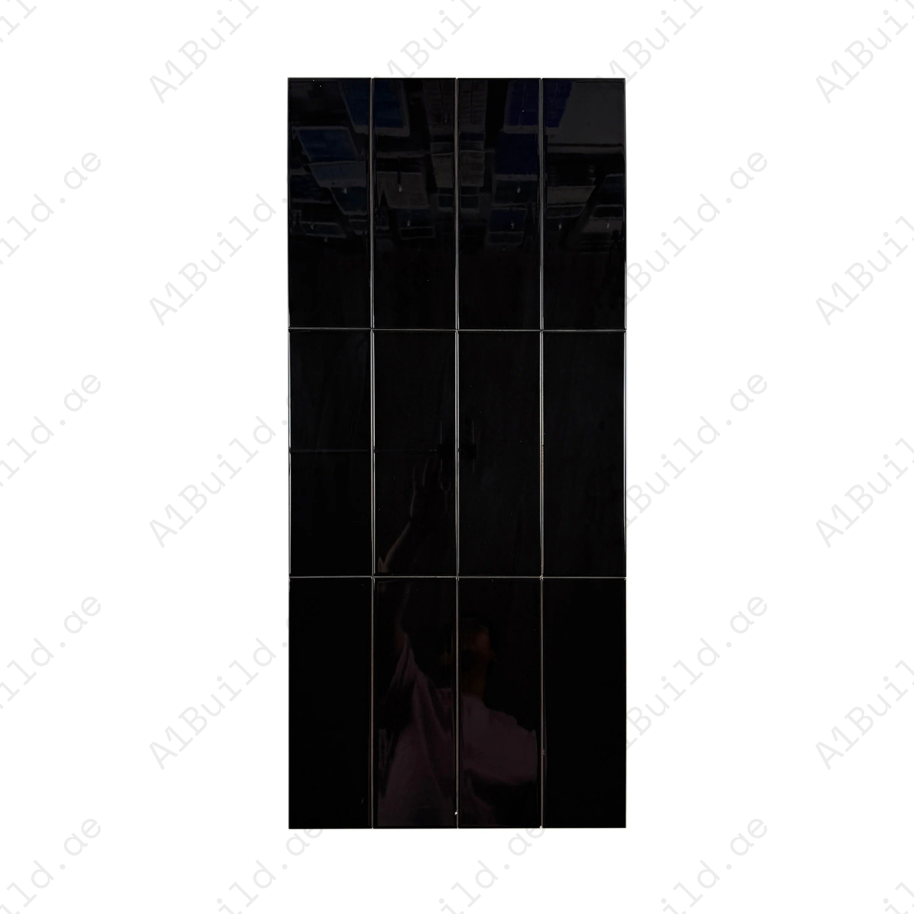 Upgrade interiors with the Urban Luxe Black Glossy Flat Ceramic Tile (100x300mm). Perfect for walls, kitchens, and bathrooms, durable with a sleek shine.