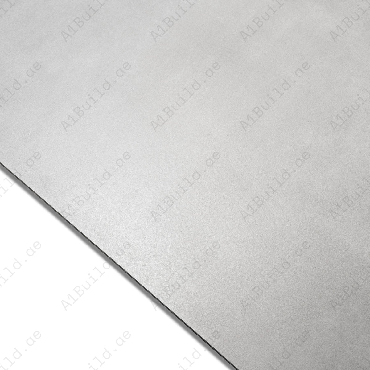 Volcano Dove porcelain tile in 60x120cm size with soft concrete texture, elegant dove grey tone and durable 9mm thickness for floors and walls.