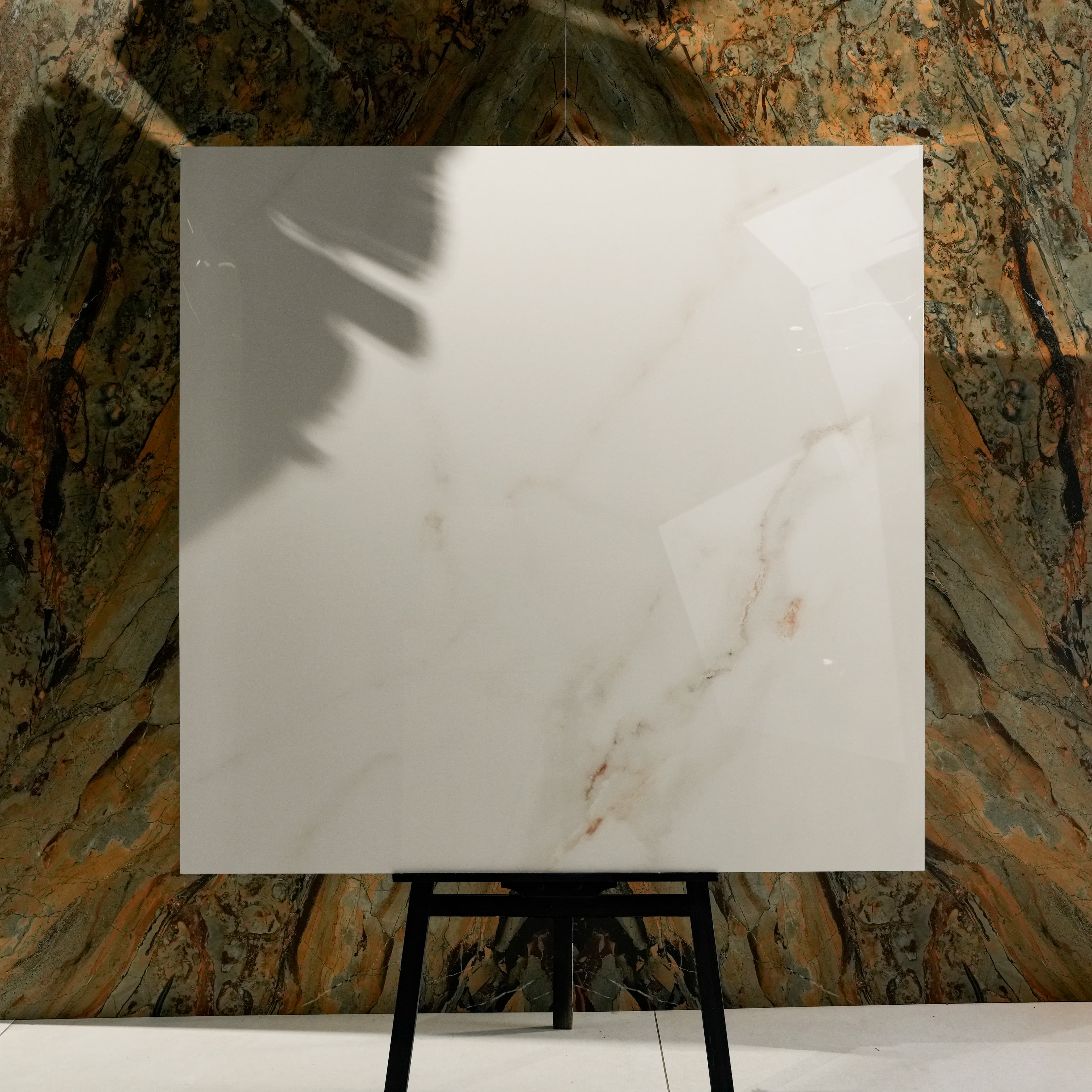Cecelia Gold Glossy 120x120 porcelain tile with ivory base and warm gold veining, displayed in UAE showroom
