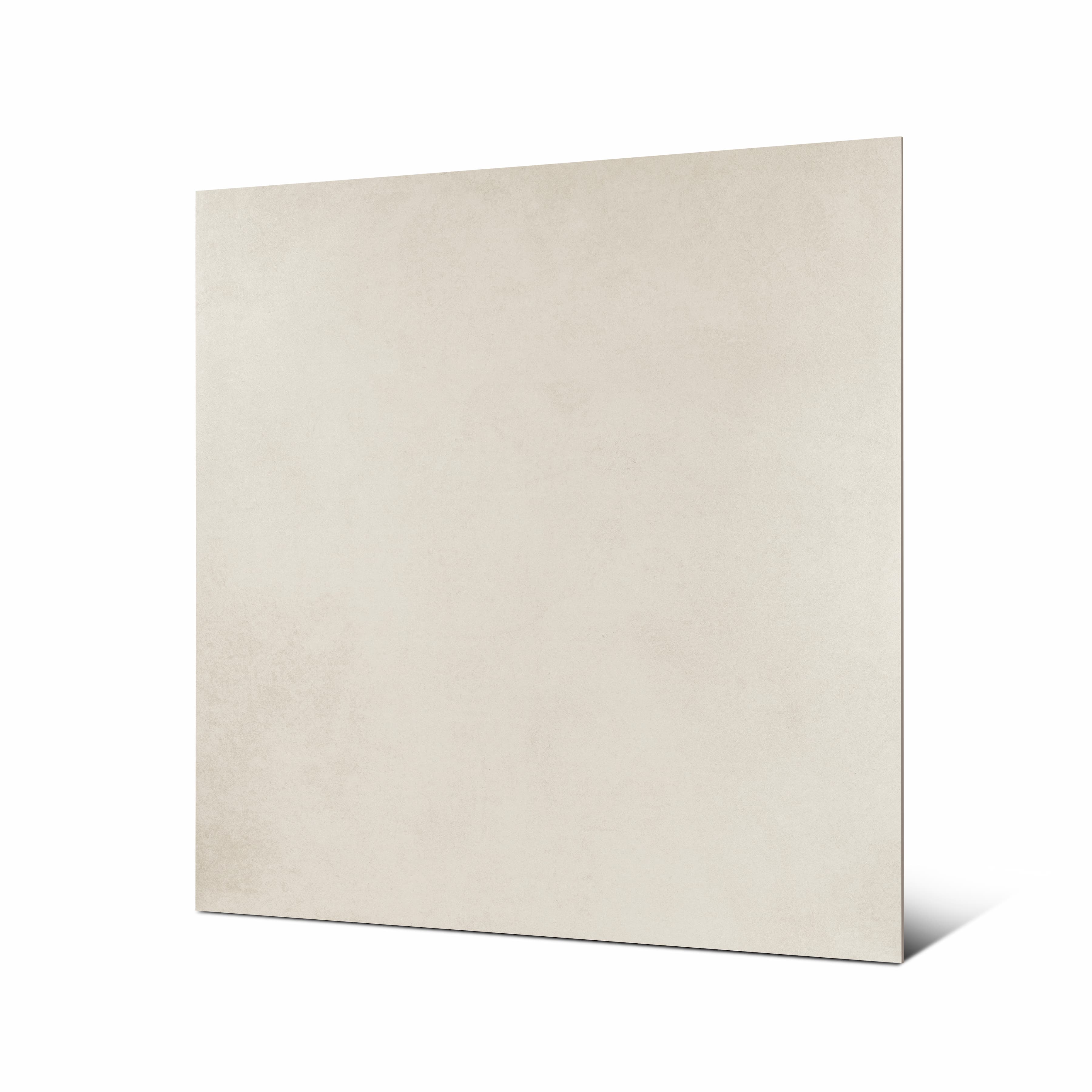 Angled view of Icona Bianco large format warm white porcelain tile showing matte finish and rectified edge