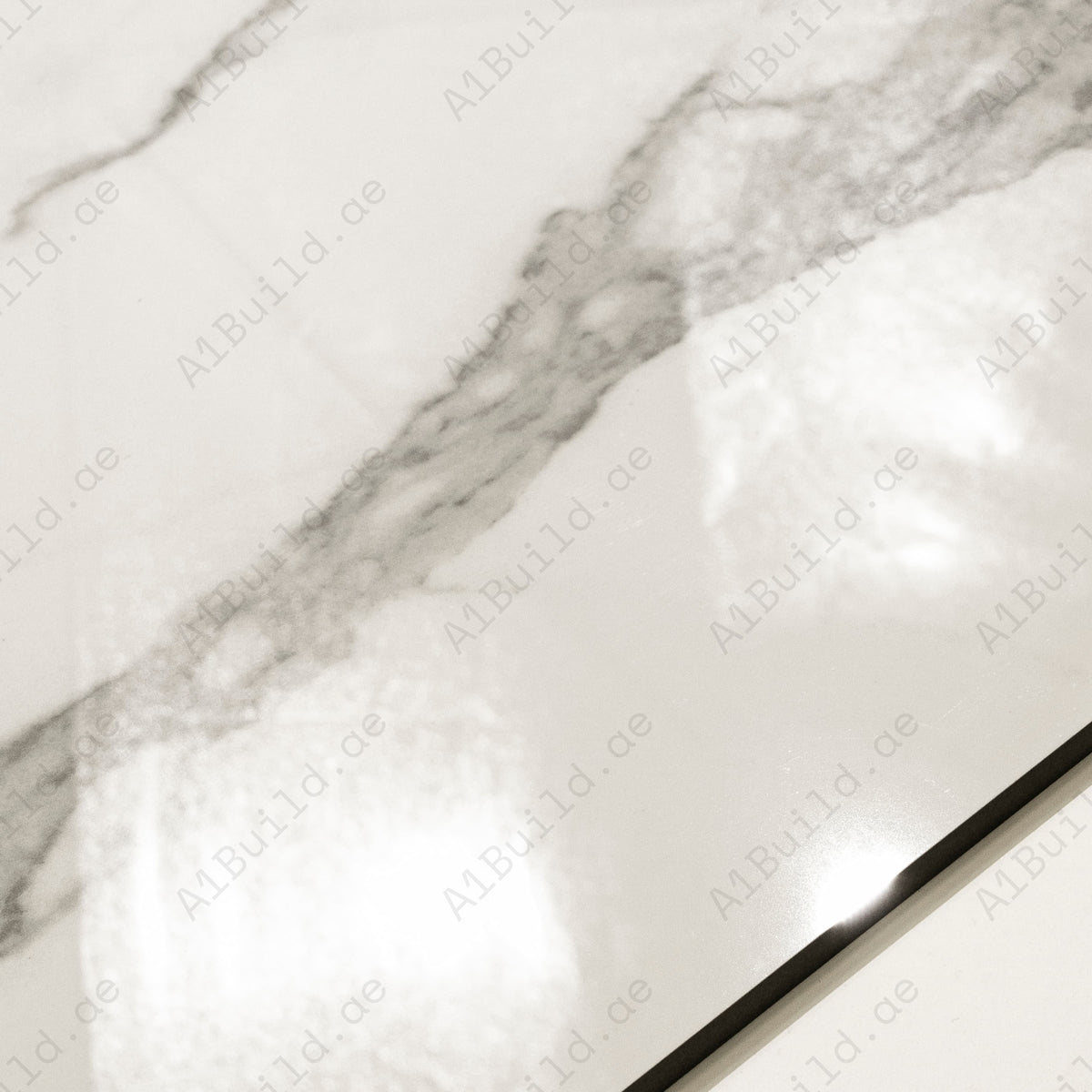  Detailed texture shot showing Calacatta veining and mirror-gloss surface of Alps Natural porcelain tile