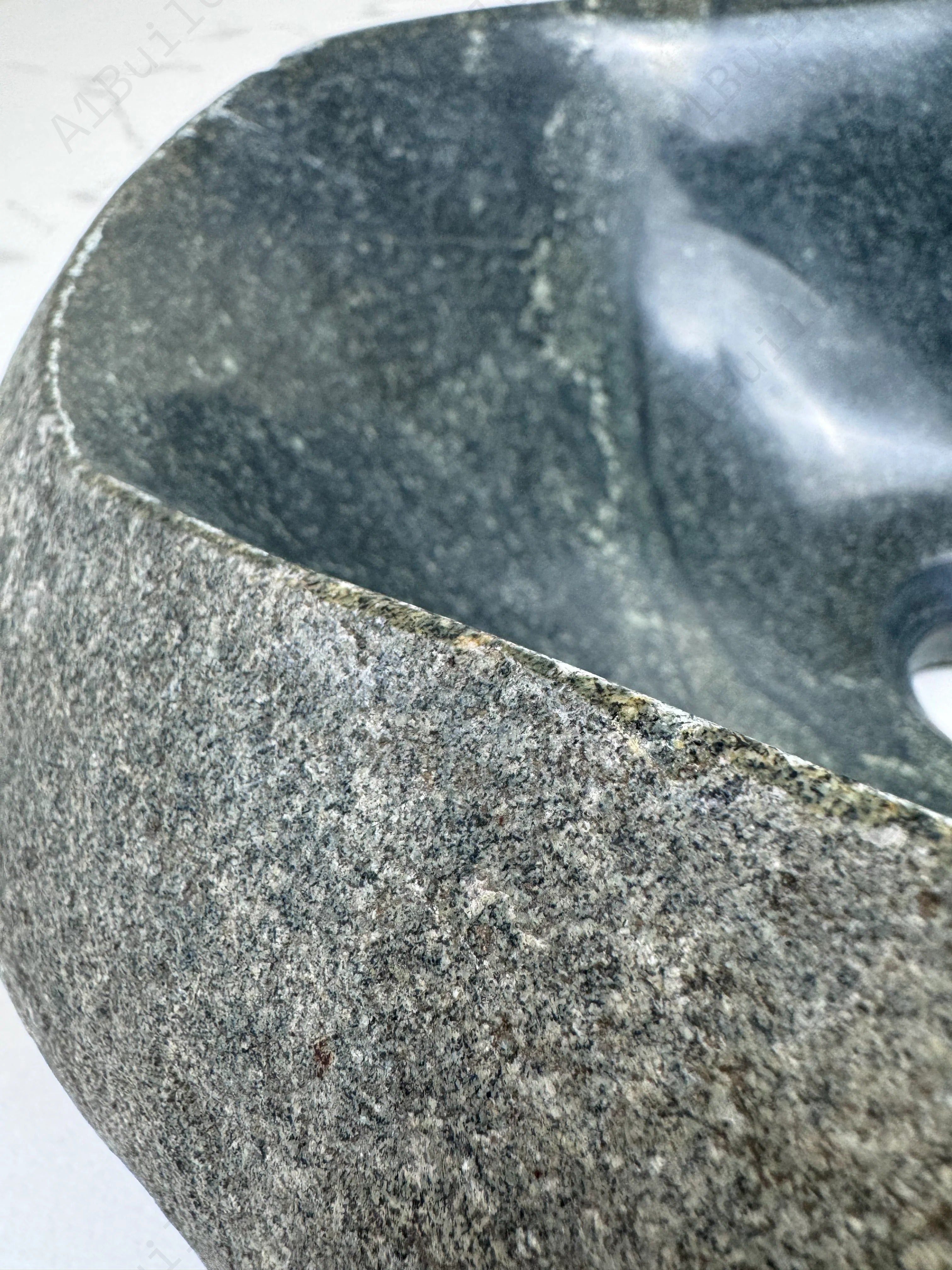 Add natural charm to your bathroom with the Marble Muse Pebble Stone Polished Irregular Wash Basin, crafted from premium marble for timeless elegance.